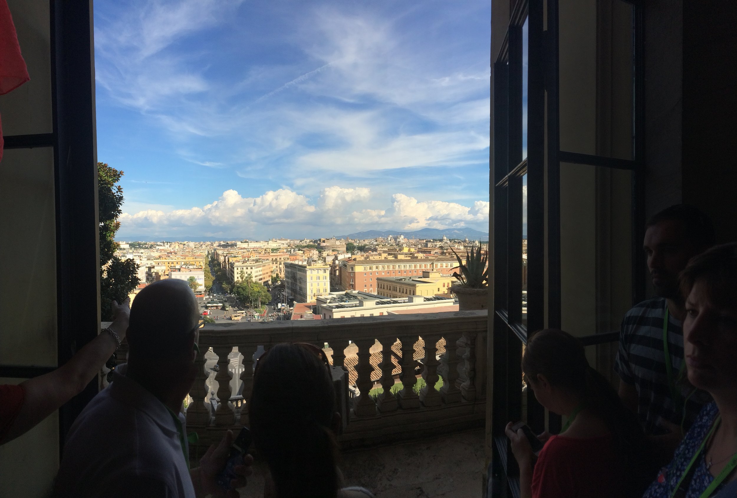 A view of the city of Rome from Vatican City. I think those may be the seven legendary hills in the distance. 