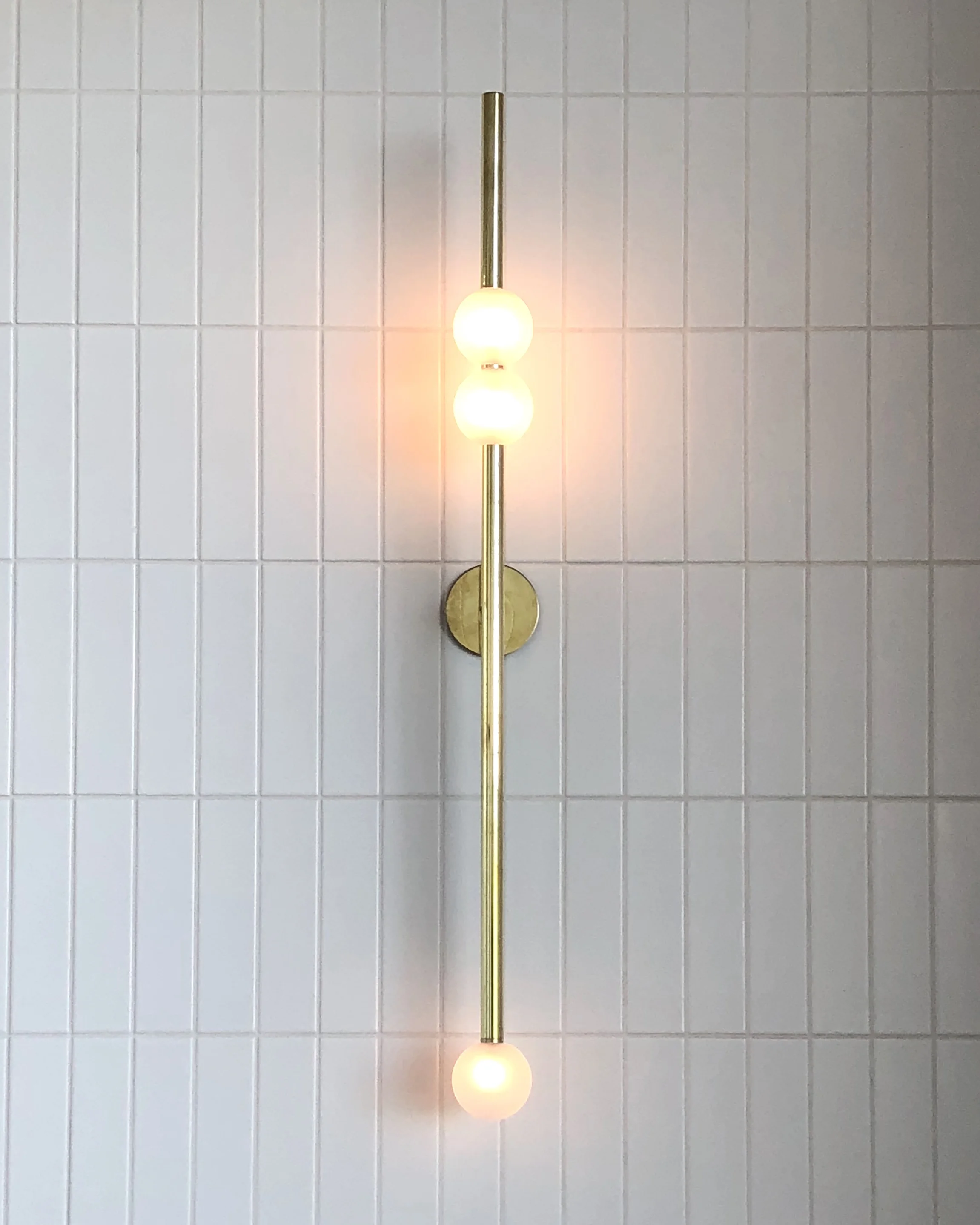 Brass arm sconce.JPG