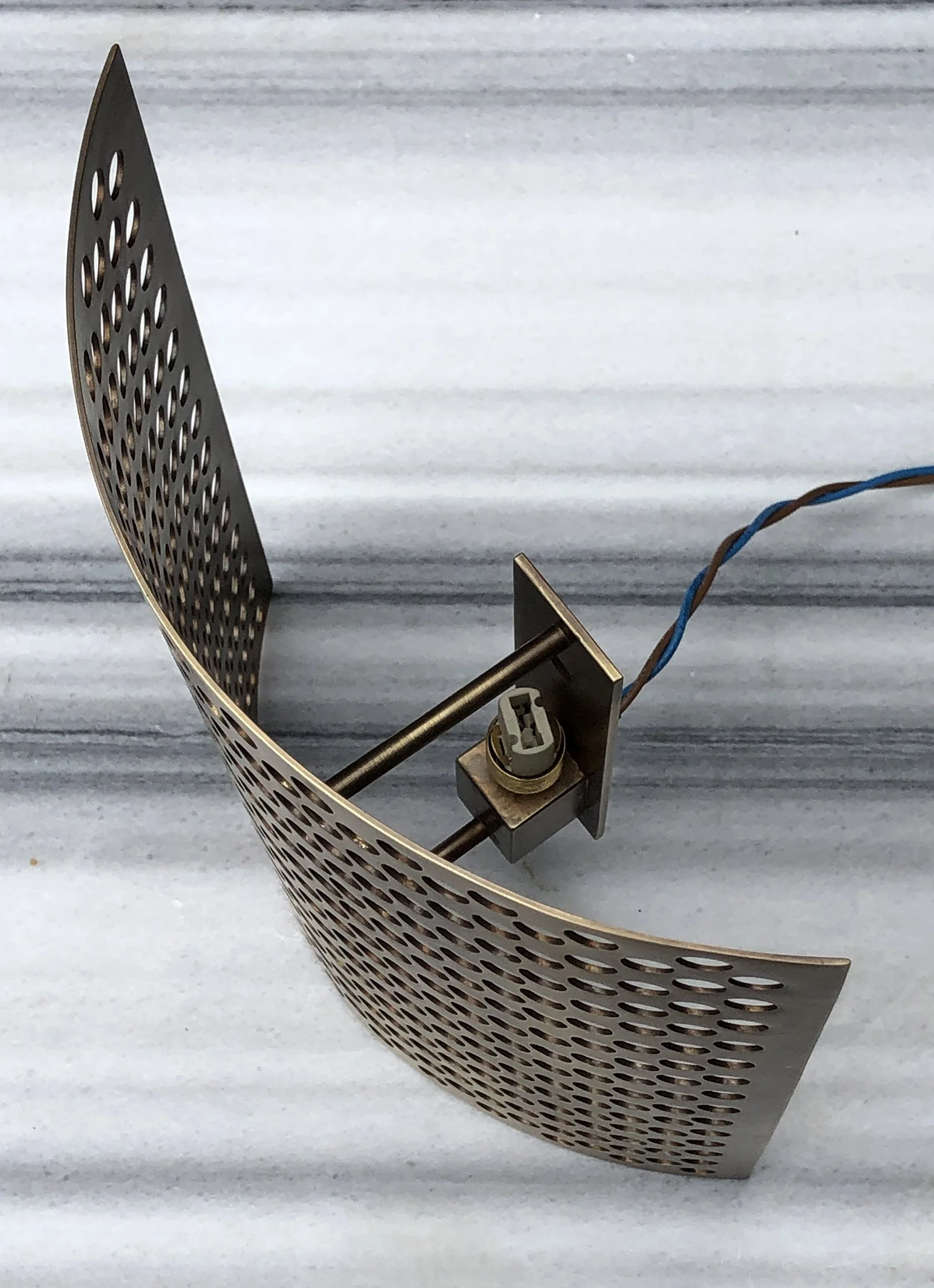 perf shield sconce 2.jpg