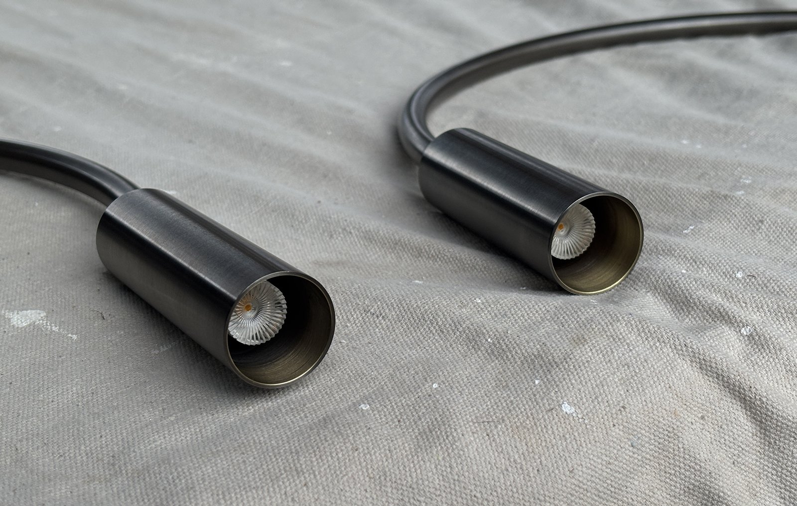 MINI PIVOTING CURVED ARM SCONCE.jpg