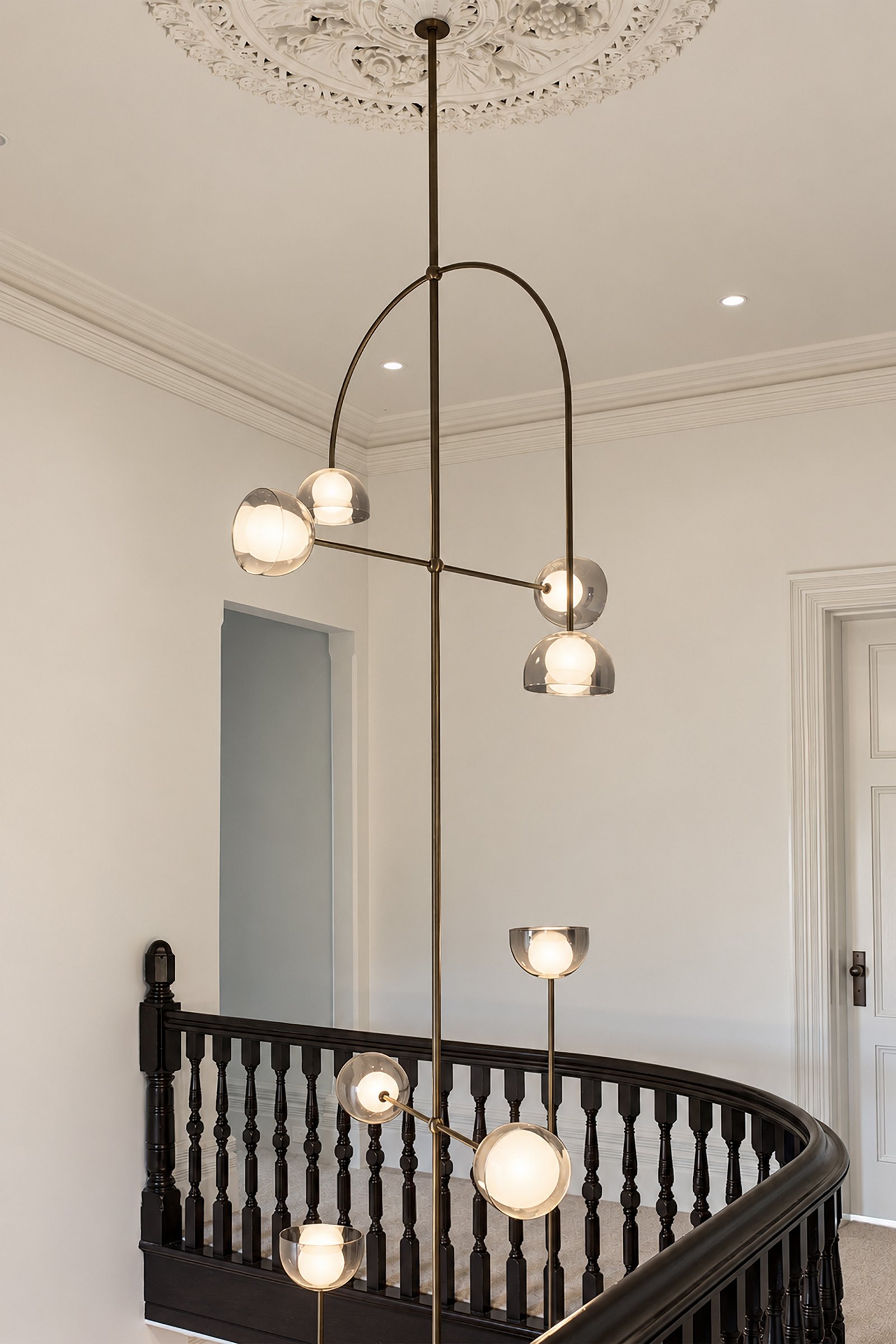 AIRY ATRIUM CHANDELIER AND BALCONY.jpg