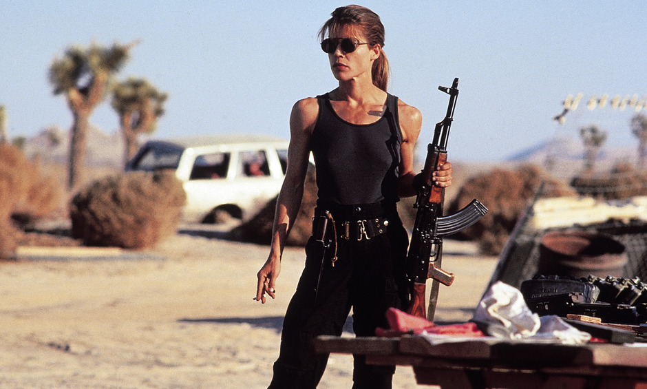 ESSAY: THE SORORITY OF CINEMA BADASSES The Sorority of Cinema Badasses consists of five women who have made varying but vital contributions to action heroism from the 1970s to the present day. Click here to introduce yourself to the woman who inspired this article in the first place – Zoë “The Cat” Bell. To read the full feature on Zoe and the Sorority of Cinema Badasses order your copy of issue #4.