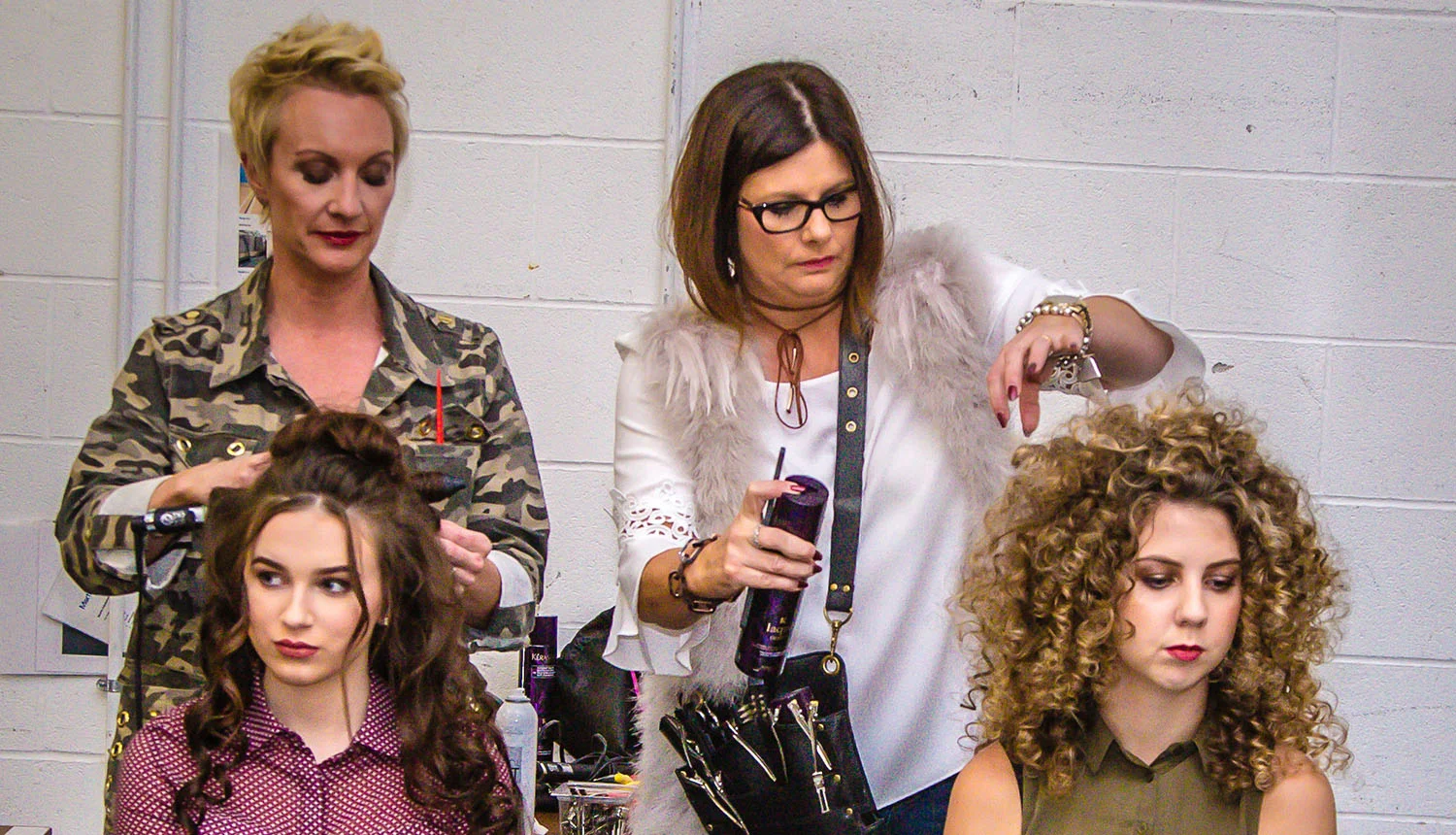 Stylish looks by Nicola and Donna at Macmillan charity fashion event