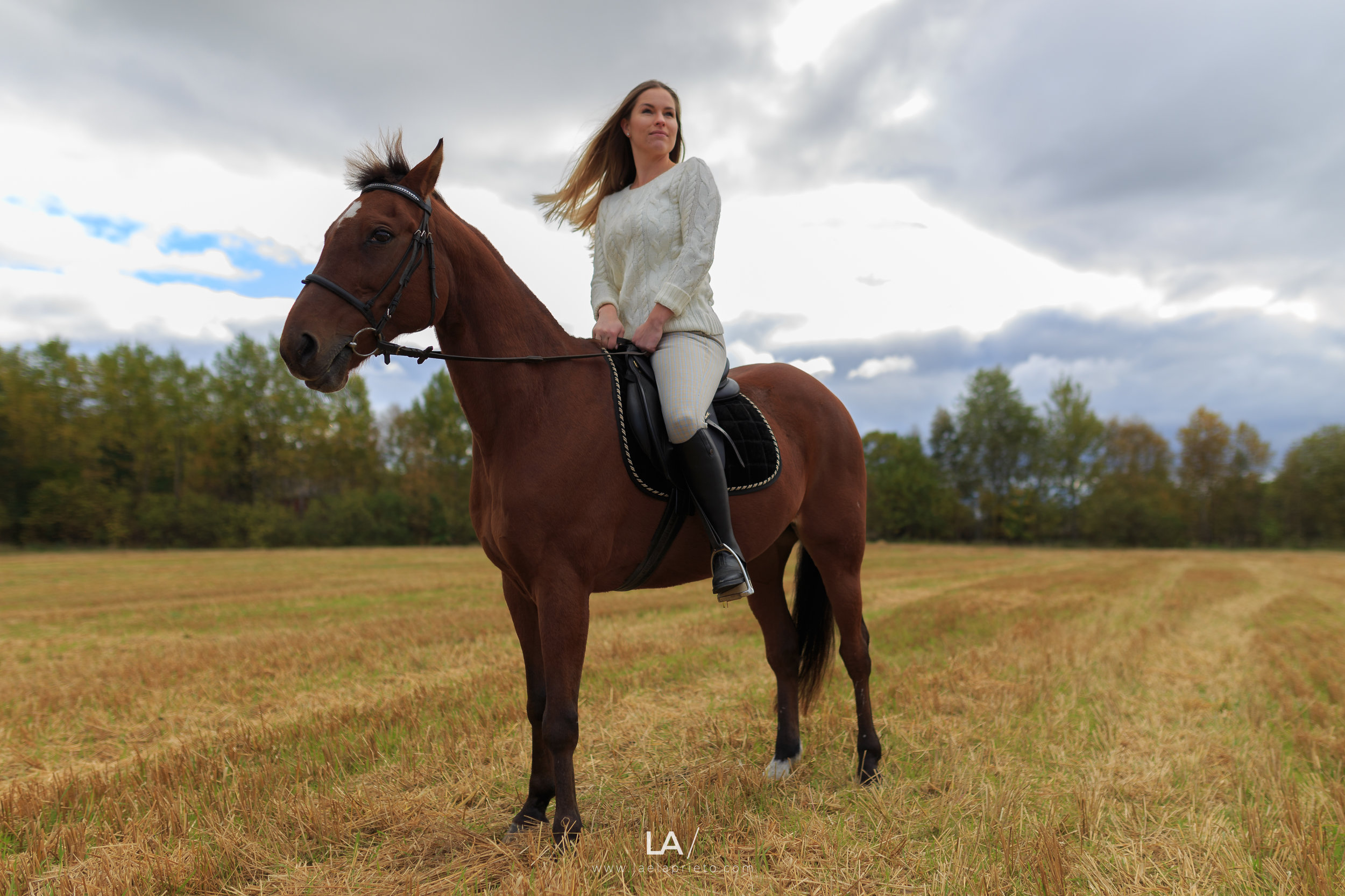 35/1.4 - Unedited RAW - could have stopped it a bit down to get her face a tad sharper. Focus is on the horse's head. Skies were unpredictable, so there may be blown-out highlights.
