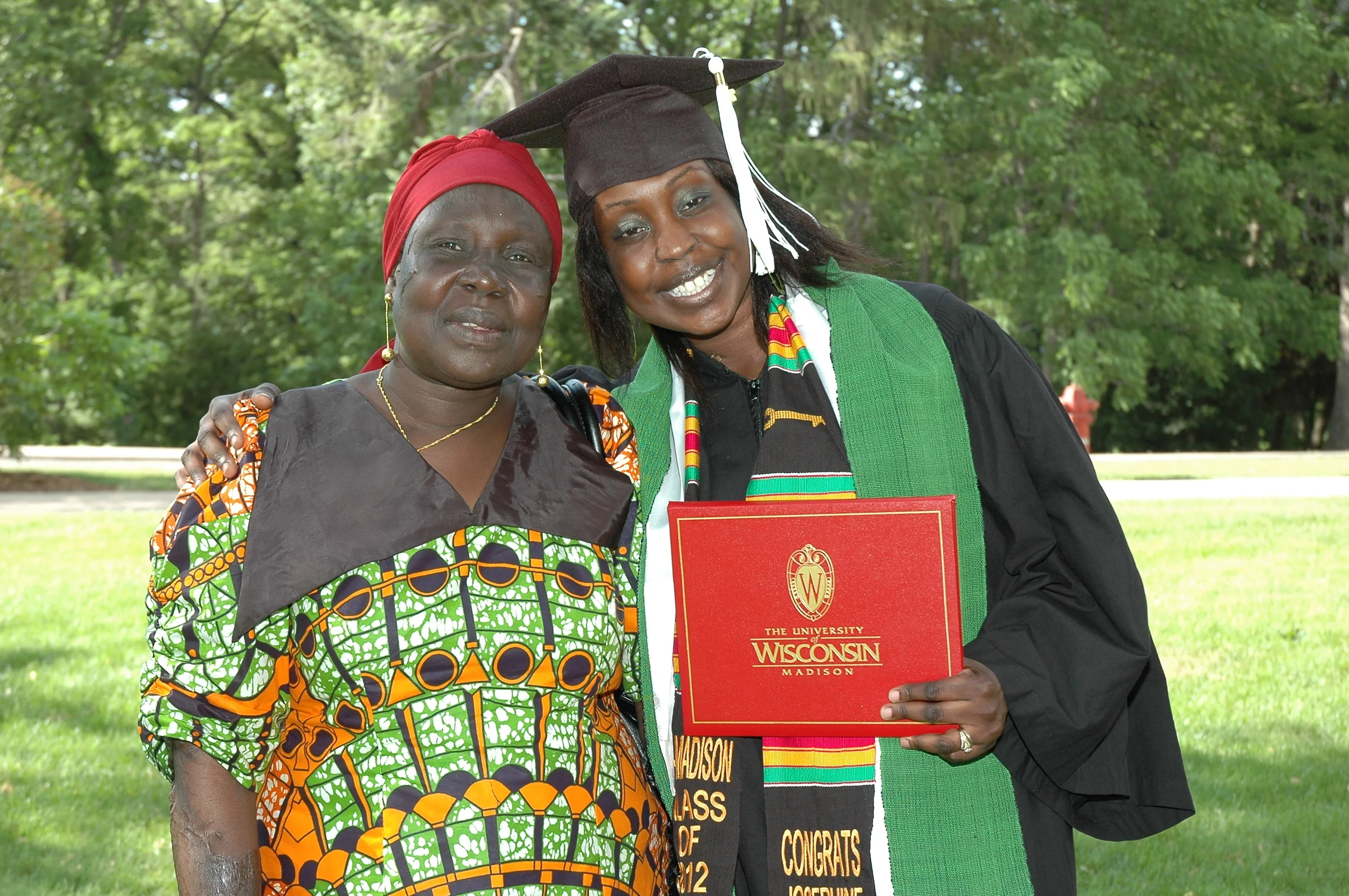 Josephine Lorya-Ozulamoi getting her UW degree with her Sudanese mother. Learn more at UW Odyssey Project .
