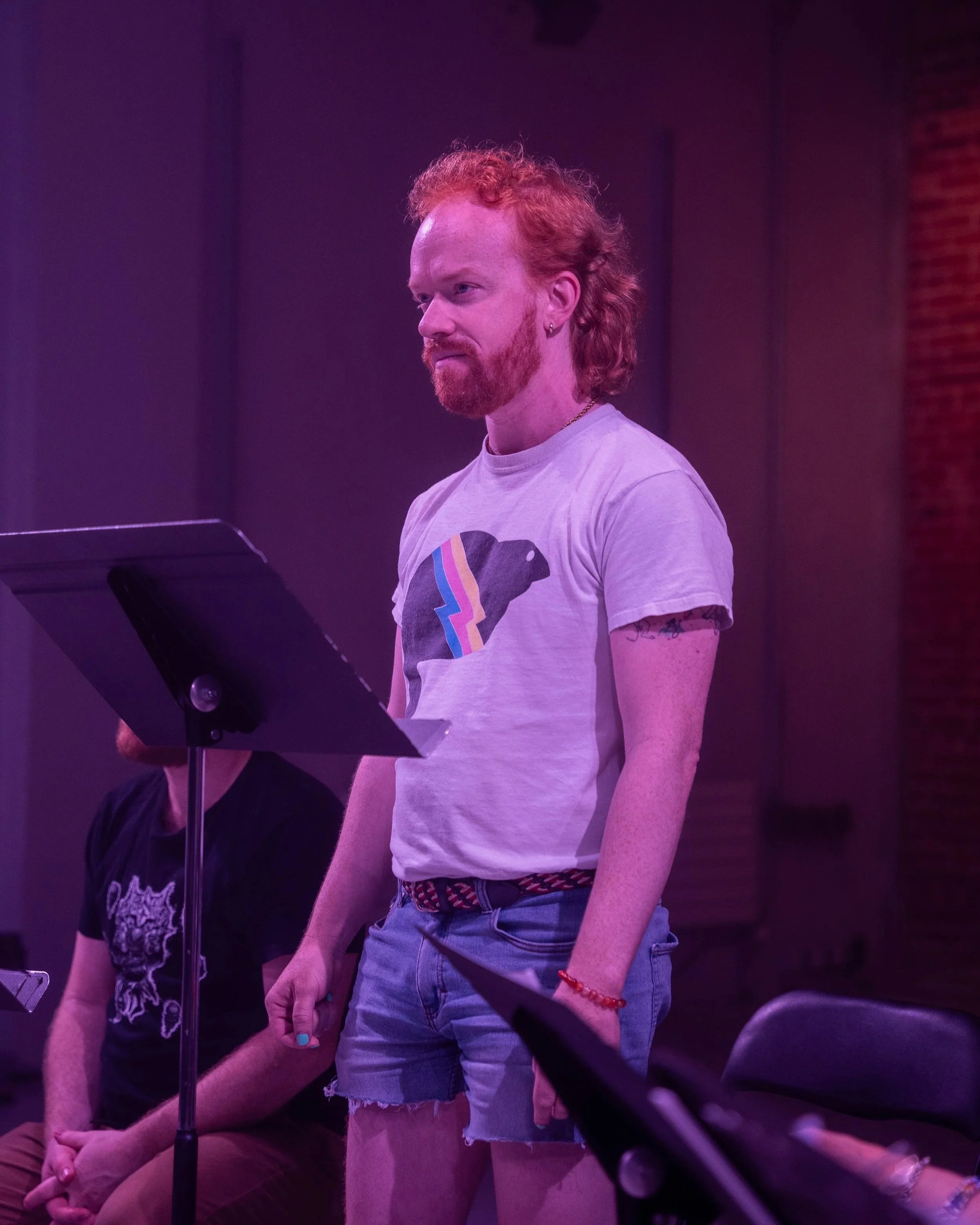 Johnnie McNamara Walker at a music stand during a reading of GAYLORD at the SummerWorks Festival.