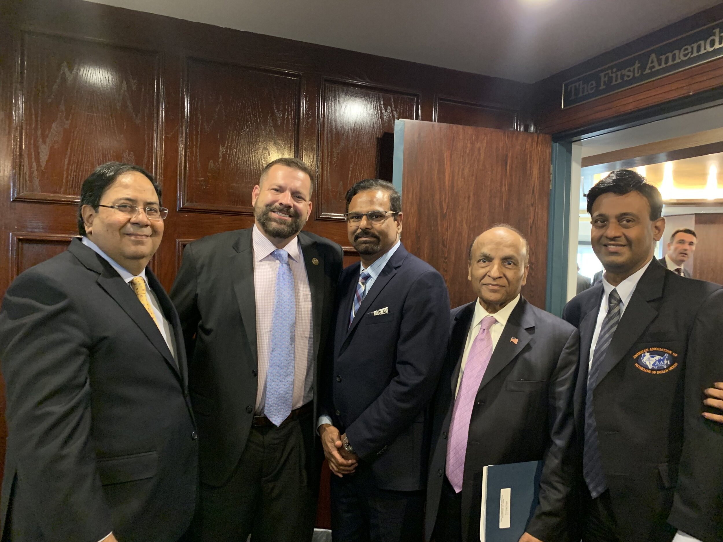   From Left to Right : Mr. Suresh Nichani, Tom Garrett (Former US Congressman), Dr. Ravi Kolli (Secretary of American Association of Physicians of Indian Origin) and Dr. Suresh Reddy (President of American Association of Physicians of Indian Origin) 