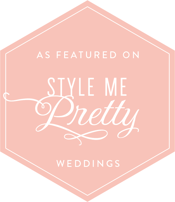 A pink hexagon badge with white text indicating a feature on Style Me Pretty Weddings.