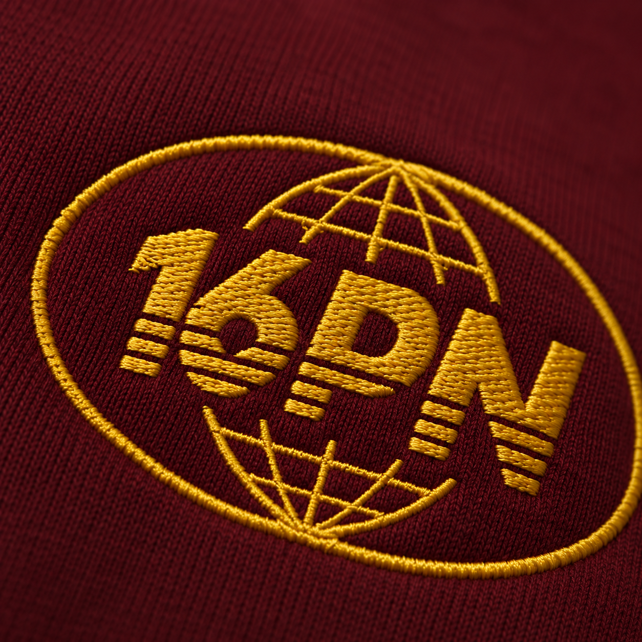 16PN embroidered logo hoodie, gold globe emblem on maroon