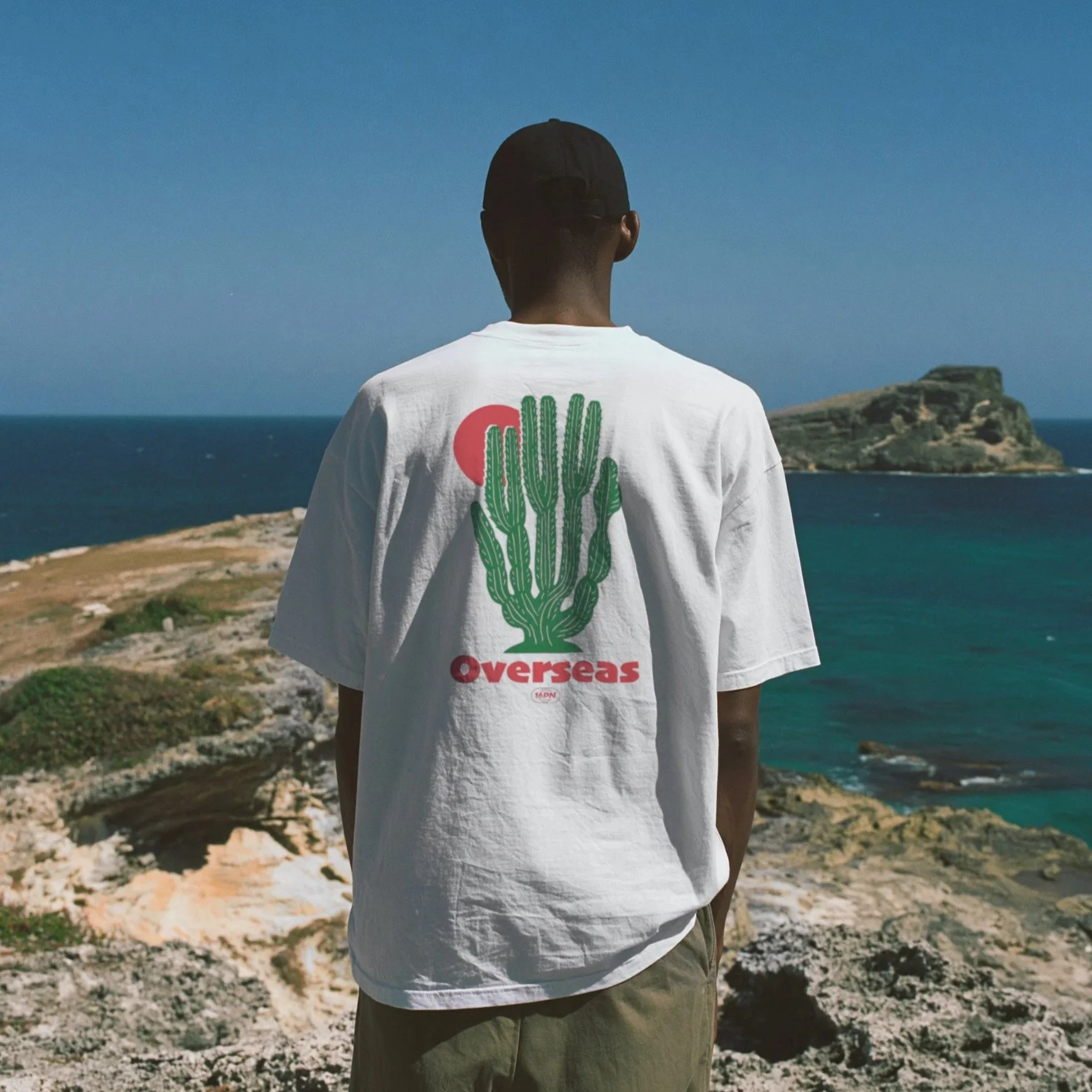 16PN Overseas tee, green cactus under red sun graphic