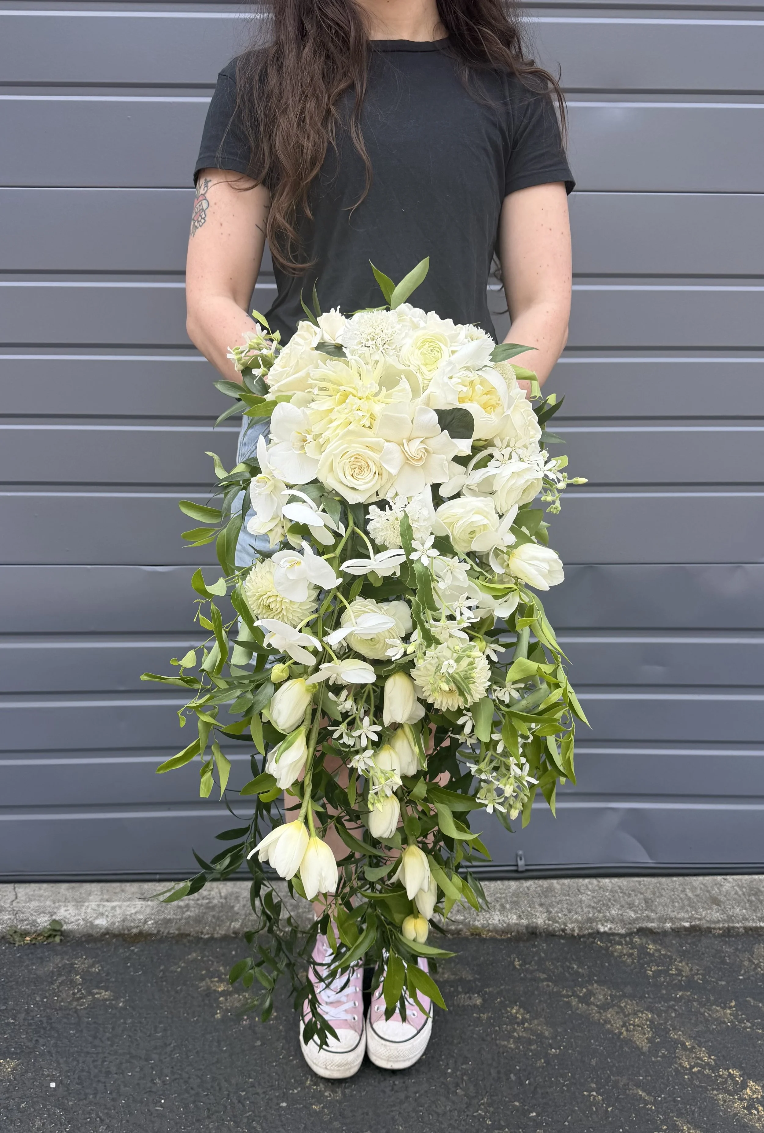premium_white_cascadig_bridal_bouquet.jpeg