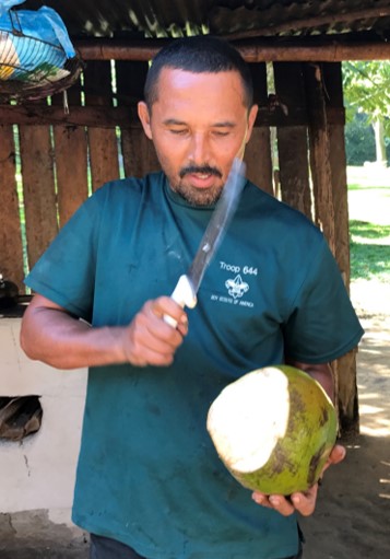 The Caretaker (Edwin) Cutting open some Fruit