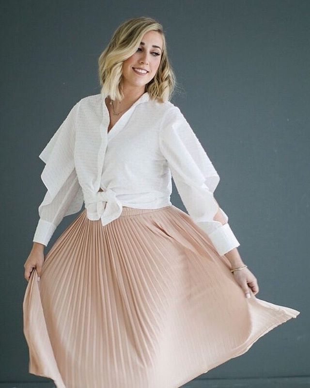 Monday&rsquo;s are for twirling (and coffee). Twirling and sipping into the work week, amiright?! I always feel fabulous in a pleated skirt and anything @abbeyglassstudio if I'm being honest. Thanks to @alicepark for making me feel beautiful during a