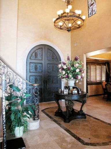 Notice the blinds are open and the lights are on. A beautiful entry will sell your home.