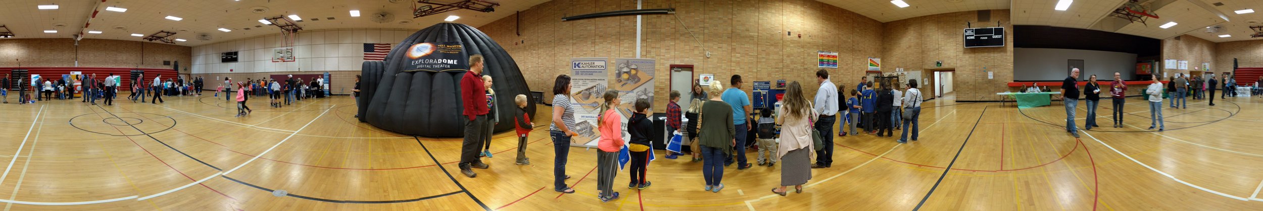 A panoramic view of all of the "Putting STEAM into STEM" activity at Five Lakes Elementary.