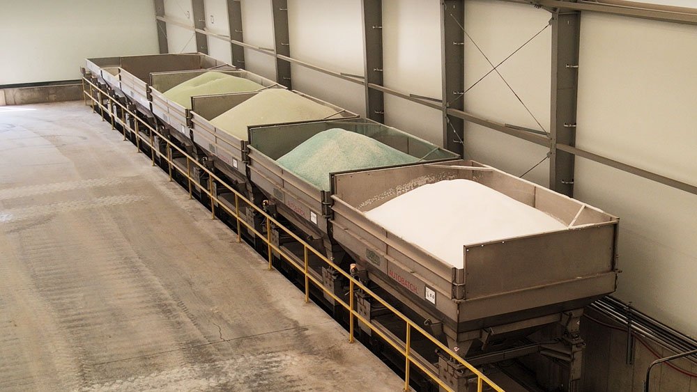  Five major product bins have a 16-ton capacity each from the new 15,000-ton building. 