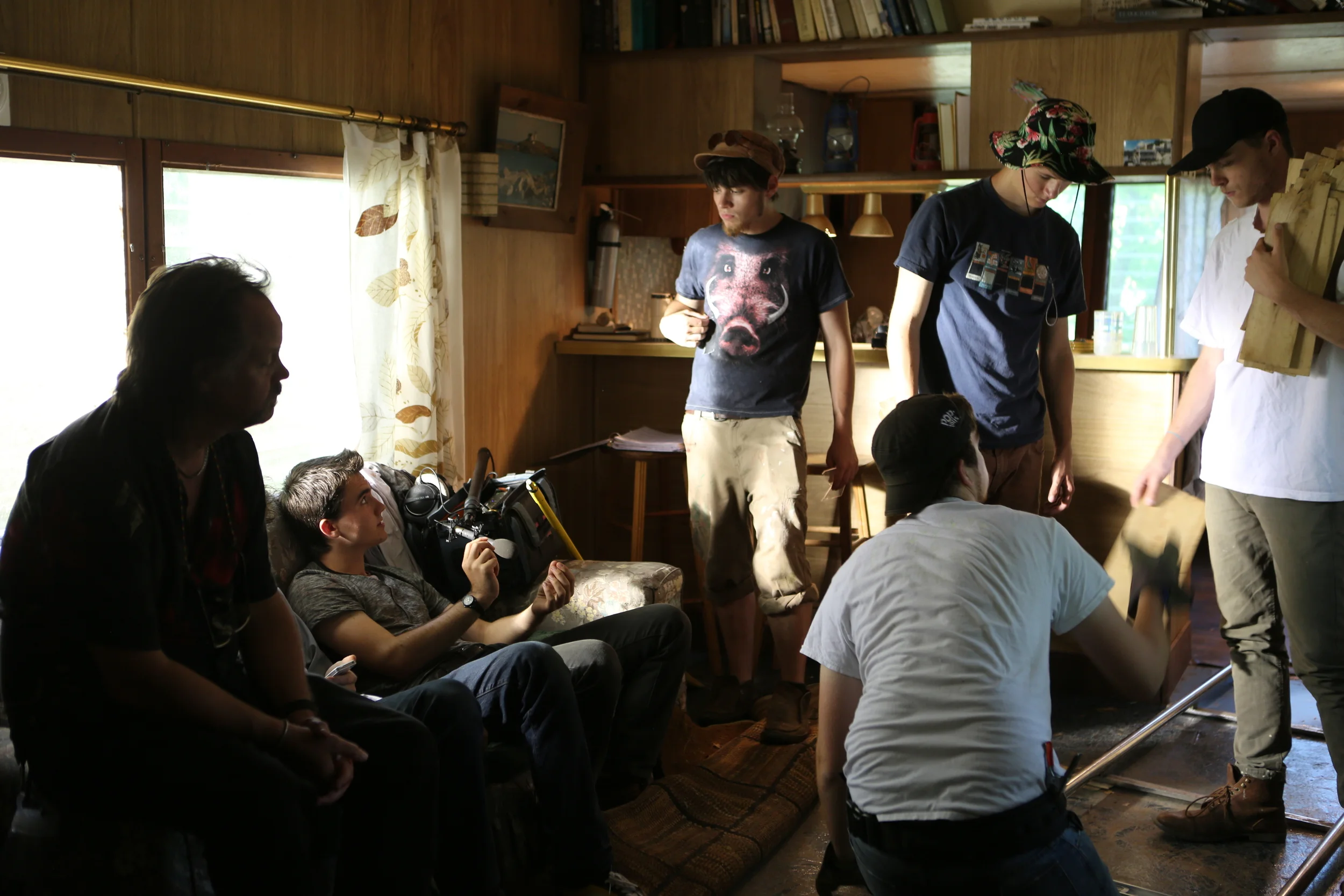 The crew lay dolly tracks, young Fessenden directs Art Director Colin O'Brien, elderly Fessenden lurks in the shadows