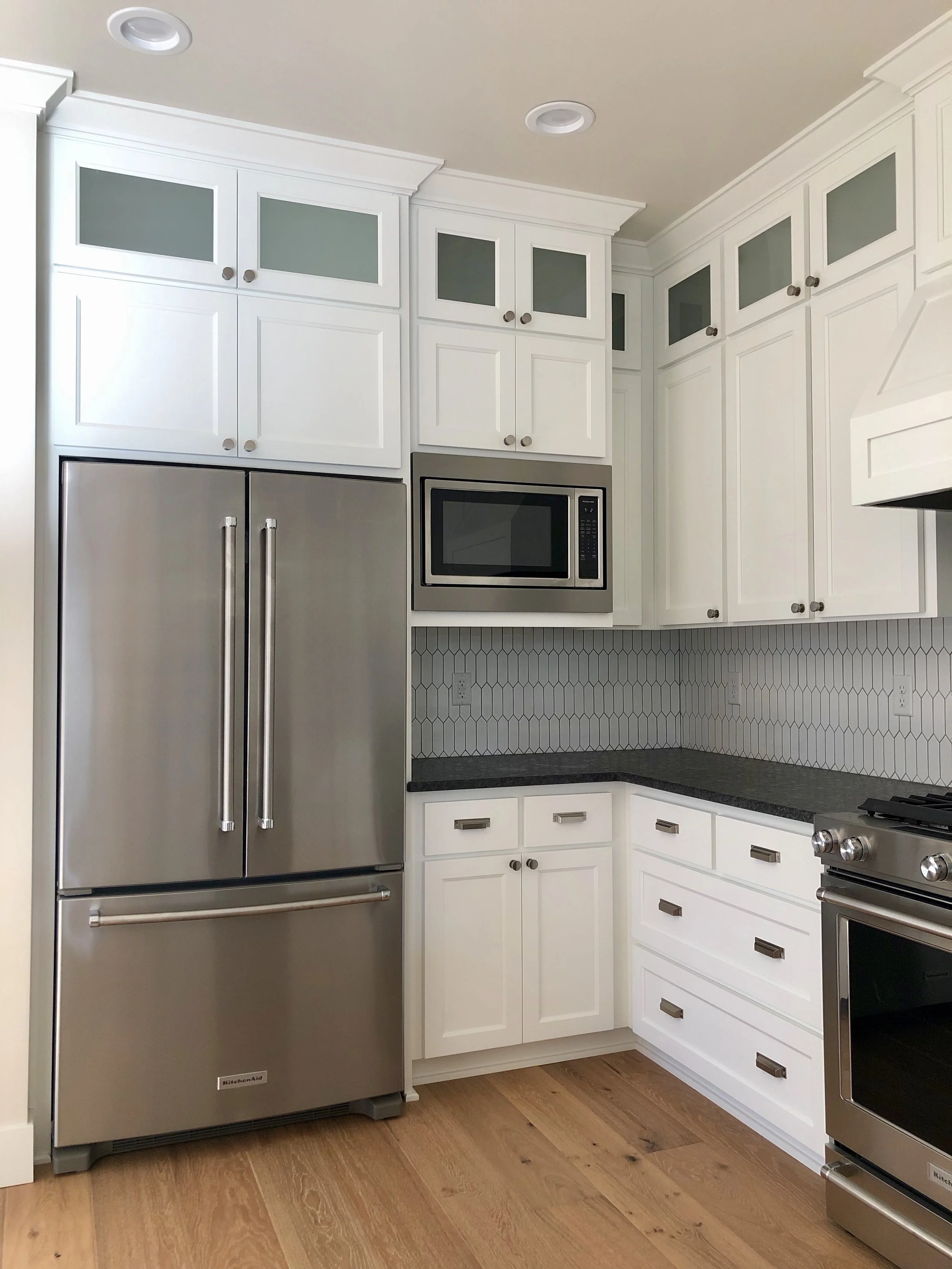 The kitchen is spacious and has a lot of storage. We love the layout and also how from the kitchen you can see out of all the windows, taking in the beautiful Ashland views.