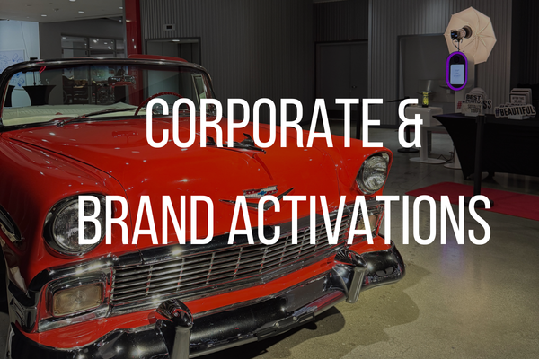 A close-up of a vintage red car inside a showroom with the words 'Corporate & Brand Activations' overlaid on the image.