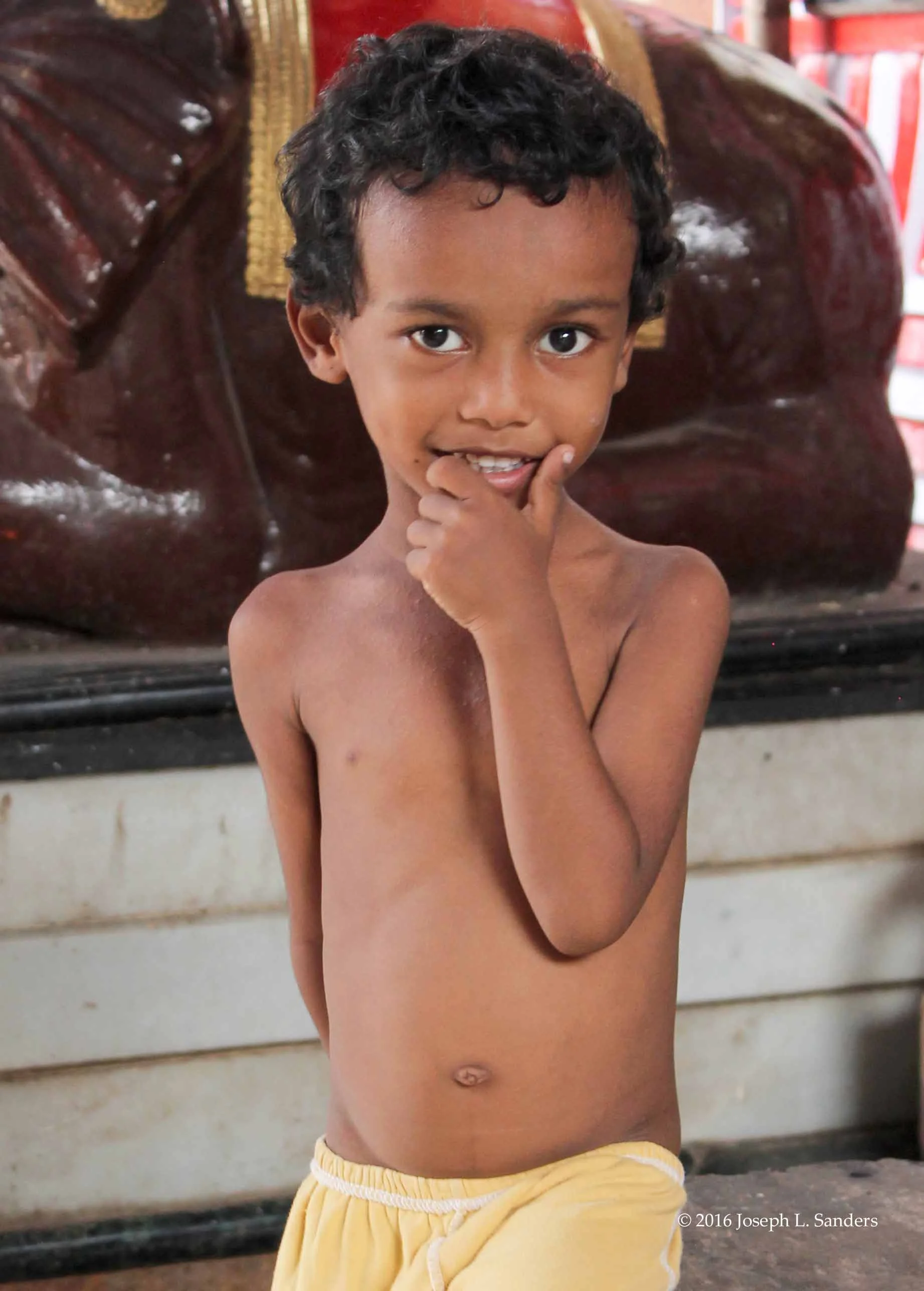 Boy at Temple - Chunabhatti1.jpg