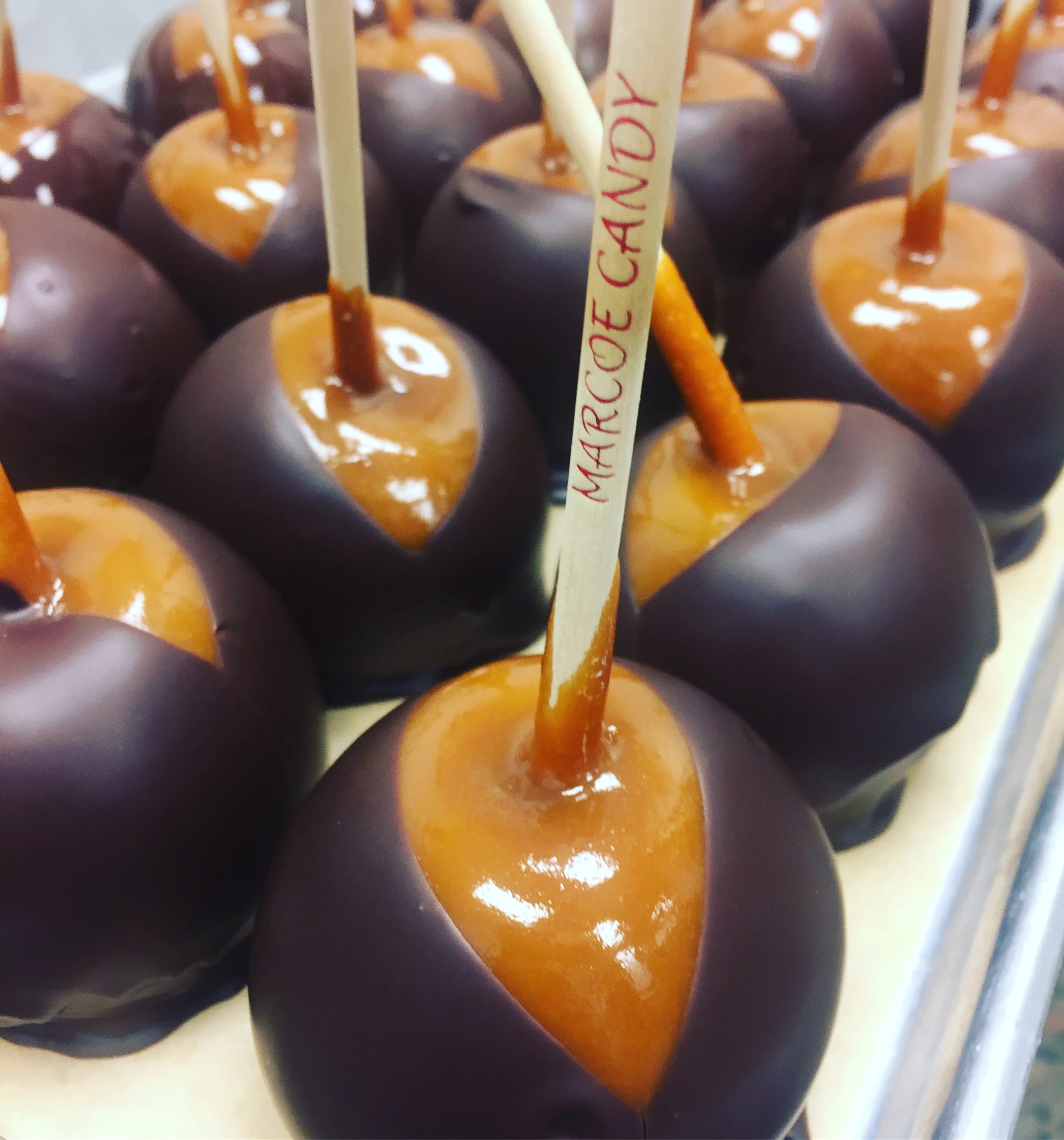 Sweet cream caramel apples dipped in dark chocolate