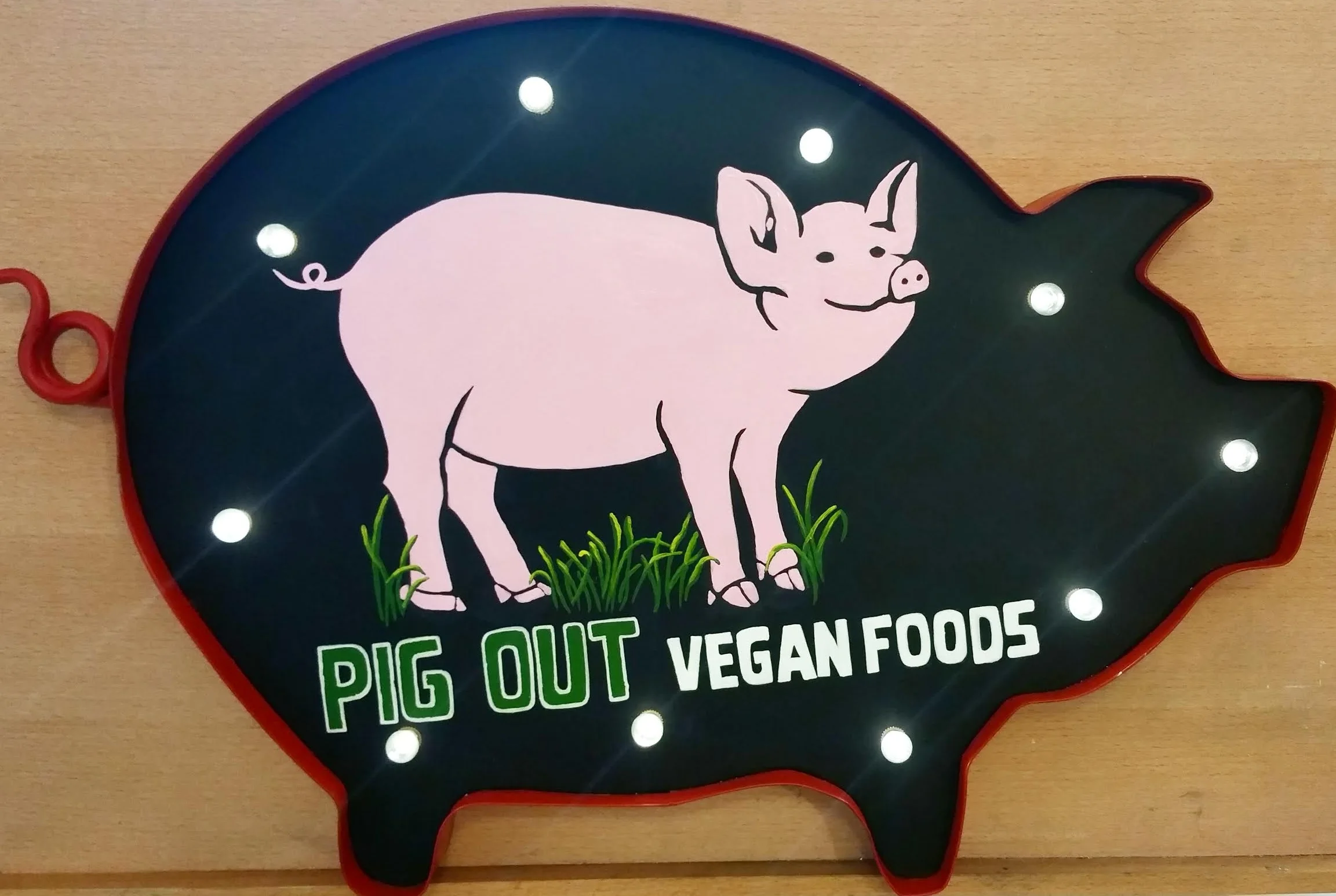 vegan food company sign