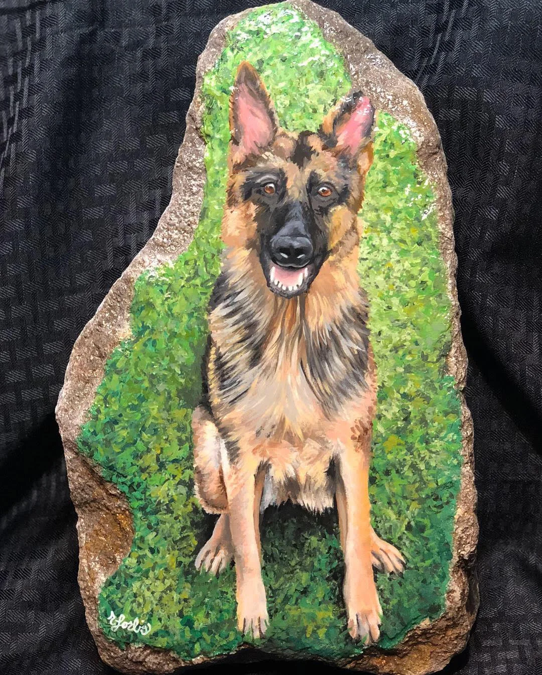 German Shepard on large rock