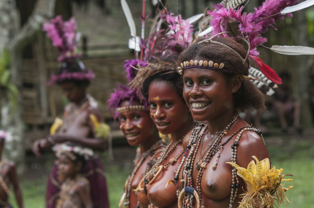 The local women of the Madang Province in traditional handmade dress.