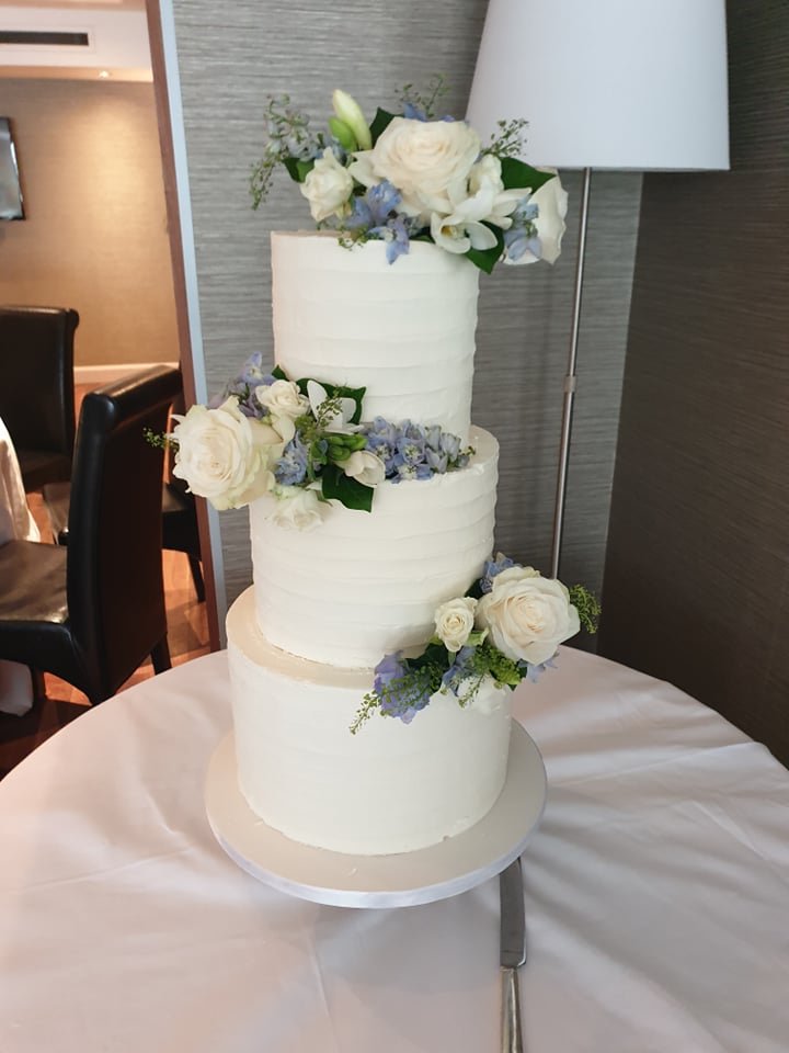 combed buttercream naked weding cake.jpg