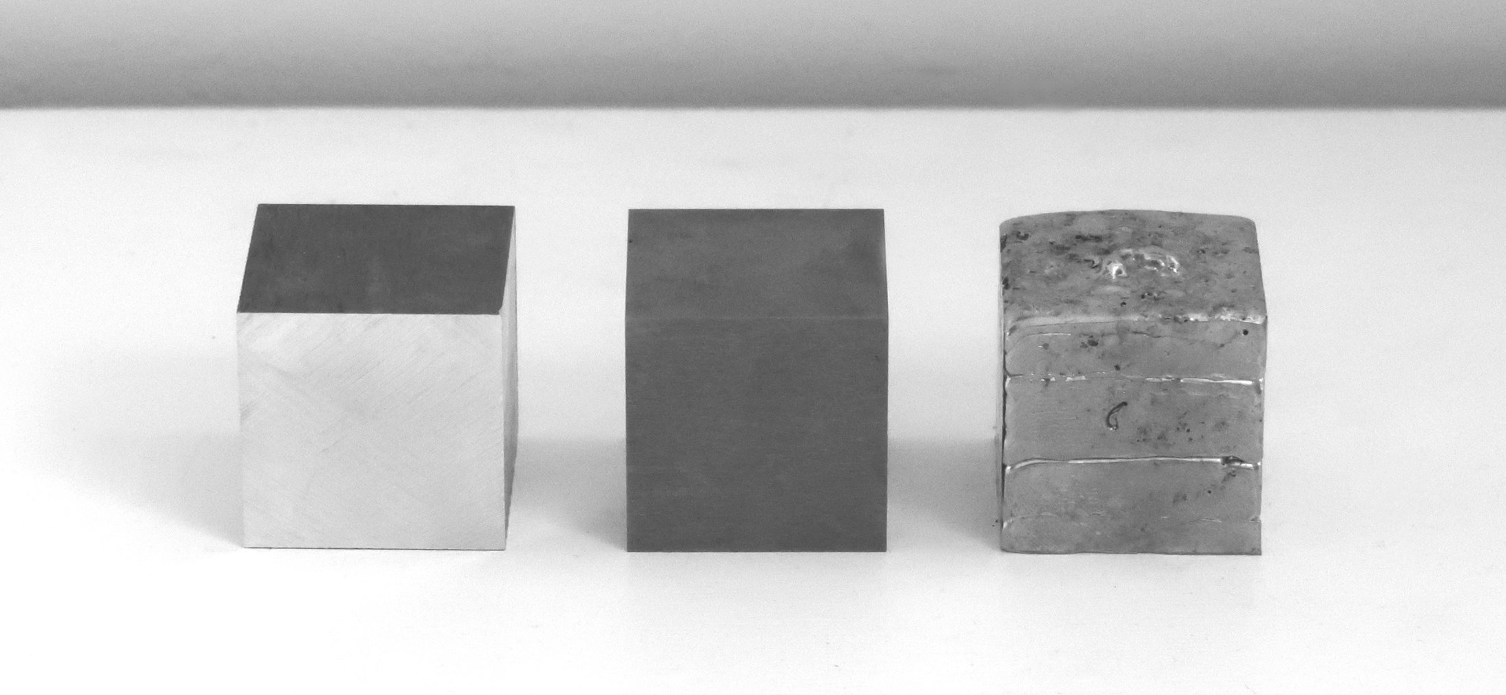 4cm Cubes Aluminium, tungsten and pewter (10th anniversary edition). Zoe Laughlin, 2007 & 17.