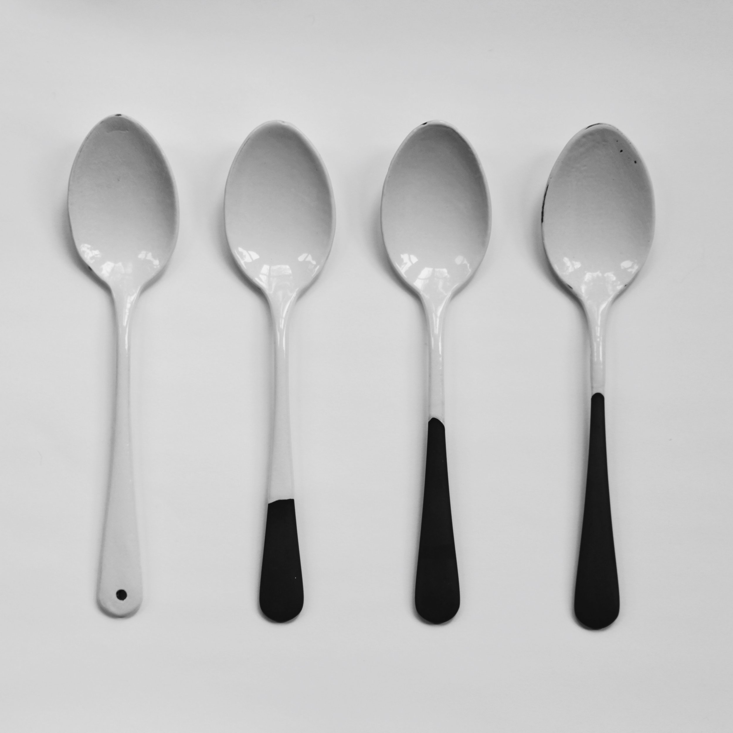 Spoons Enamel and stainless steel. Zoe Laughlin, 2014.
