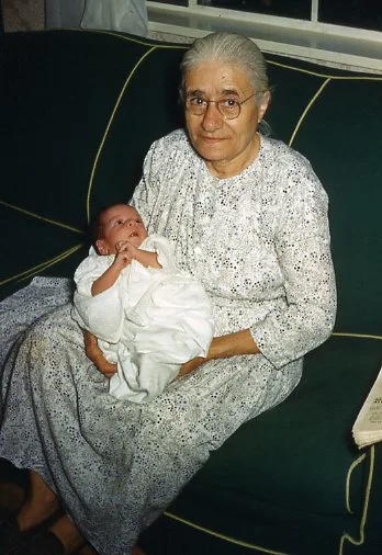 Grandma Iskouhy, a survivor of the Genocide, with one of her grandchildren.