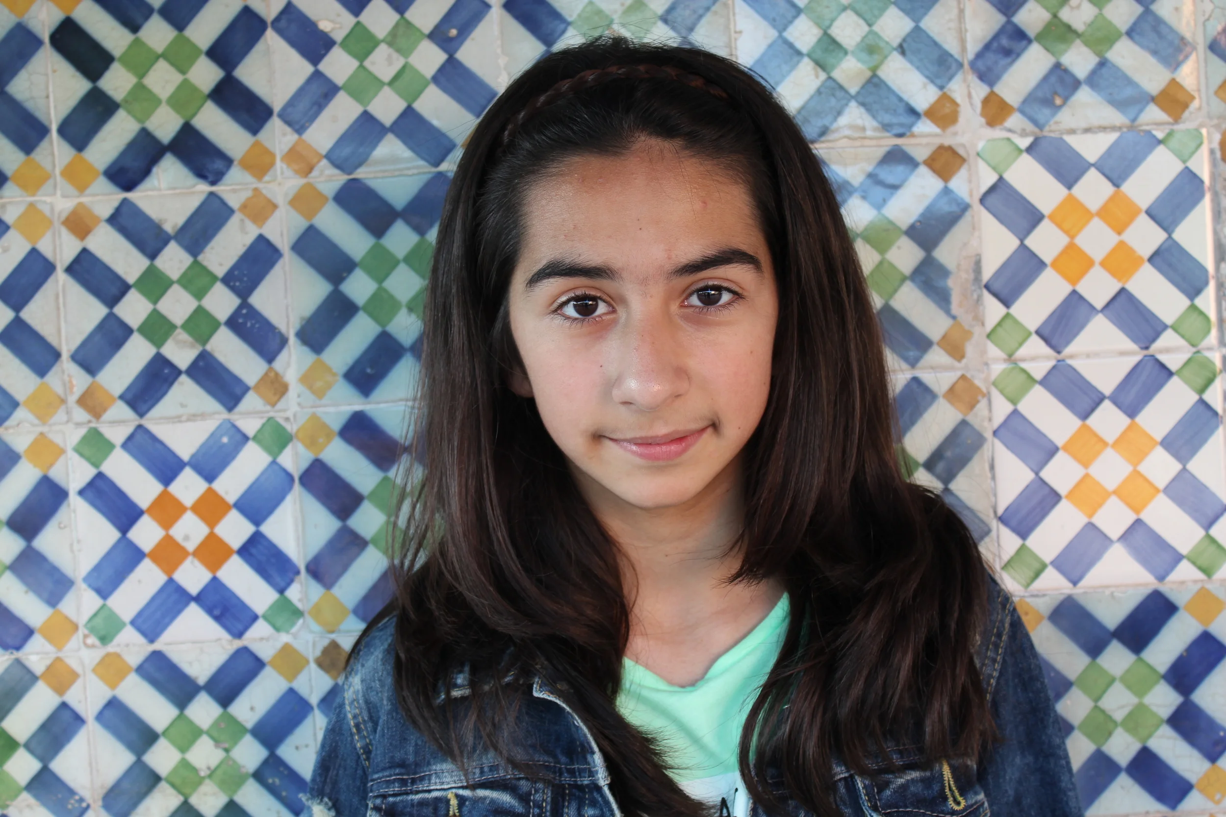 Sylvia lives in Lisbon, Portugal. The beautiful tiles behind her on on the walls of her favorite cafe. Sylvia’s parents come from Armenia but Sylvia and her brother were both born in Portugal. There are many musicians in the family and Sylvia is learning the cello. She speaks Portugese and Armenian and is learning English and Spanish.