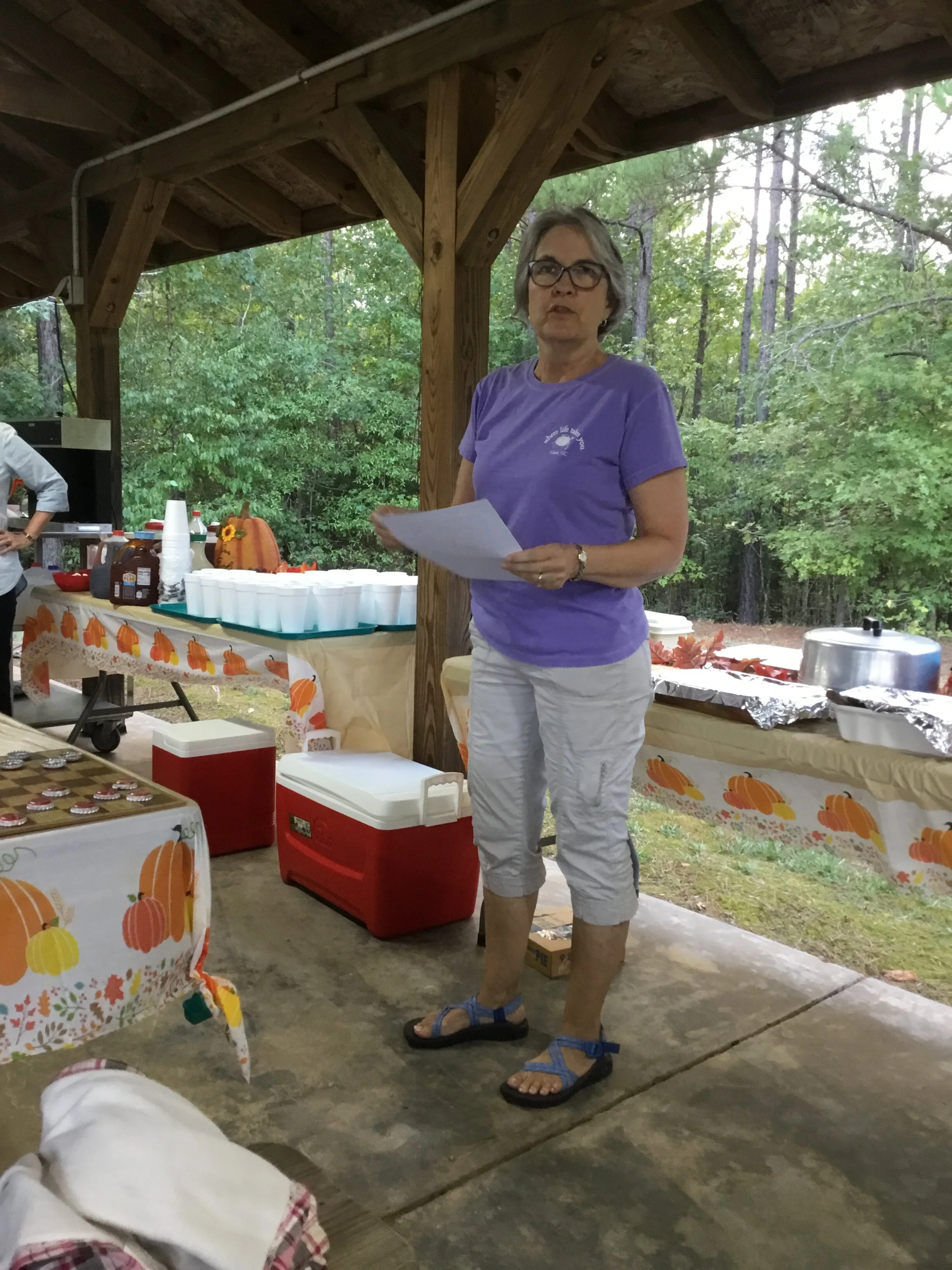 Jeannie doing the devotion at Family Night.JPG