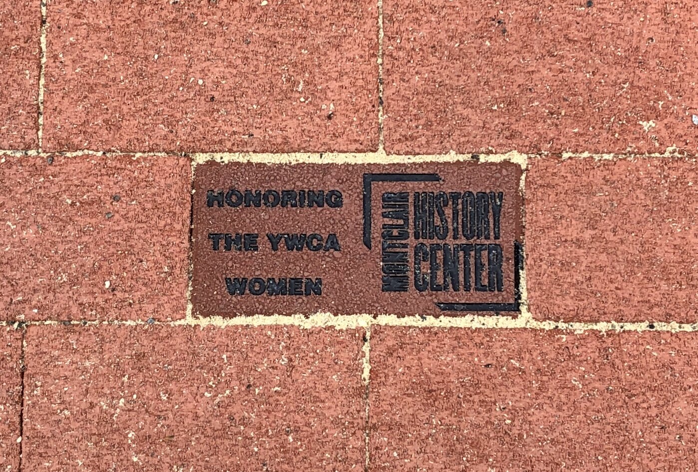  Commemorative brick honoring the YWCA Women, in brick path 
