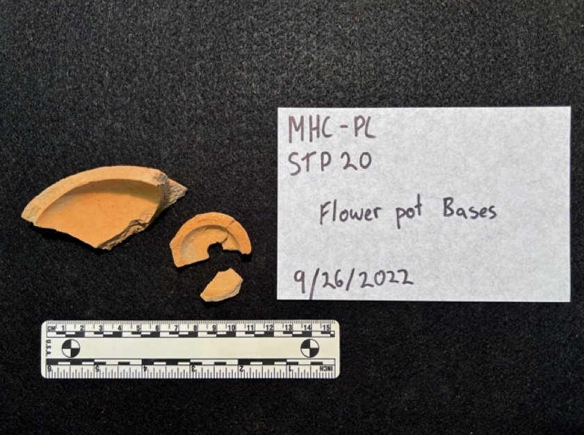 Figure 7. Two sizes of flowerpot bases. The artifact grouping the right possibly represents a seedling pot.