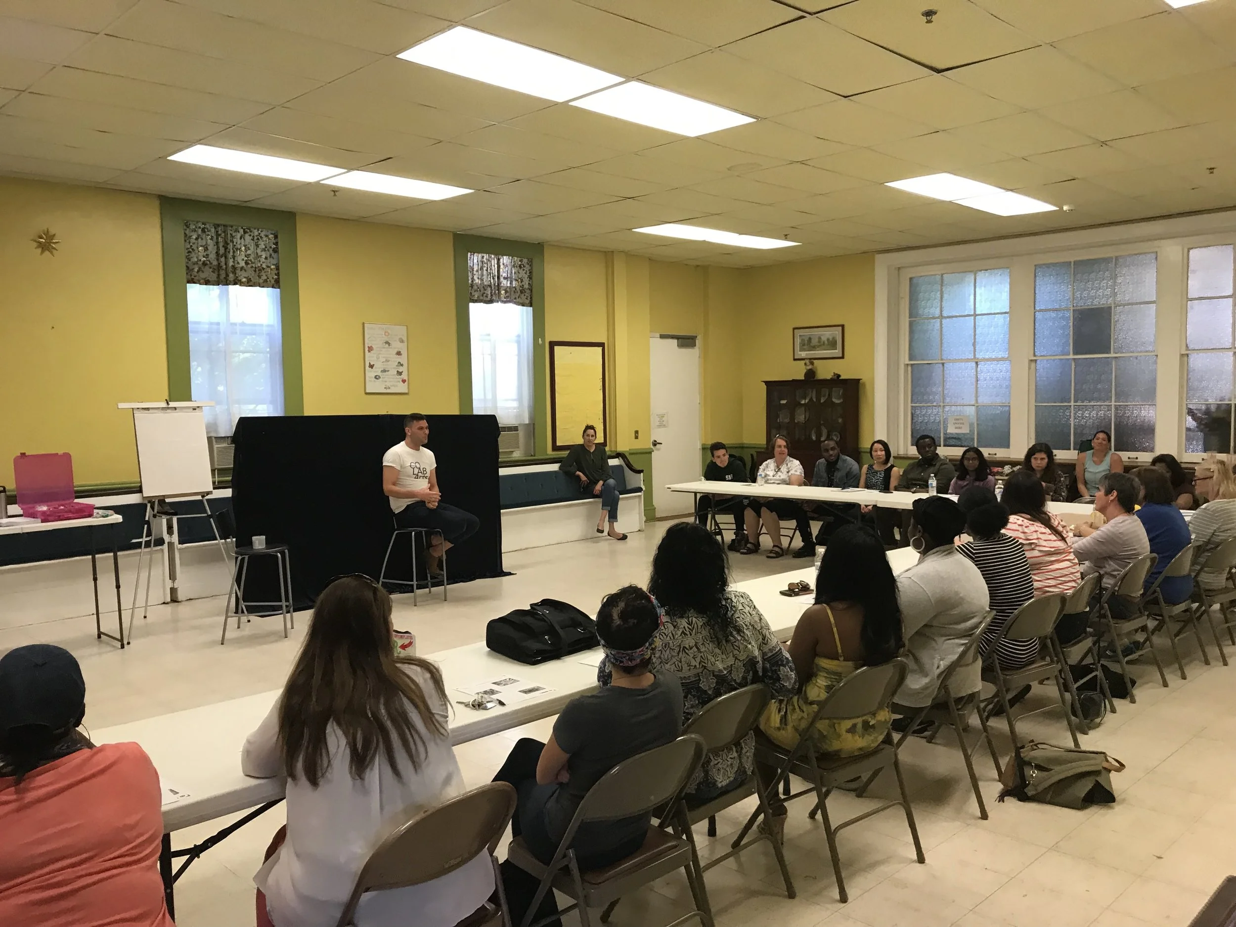 Lead teaching artist Dustin Ballard conducting a community workshop.