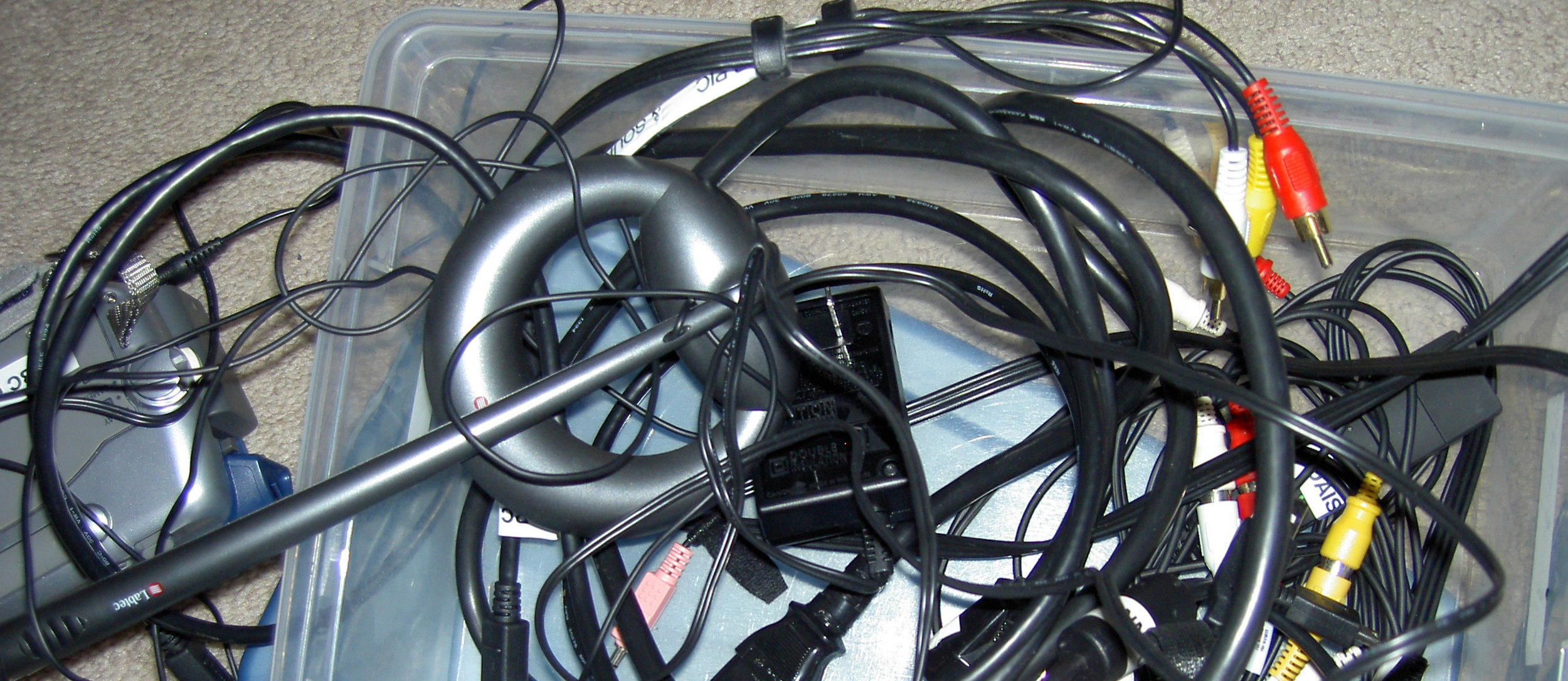 The dreaded power cord knot. Whoever took this stock photo shot went to the trouble of tossing in a really outdated web microphone for good measure!