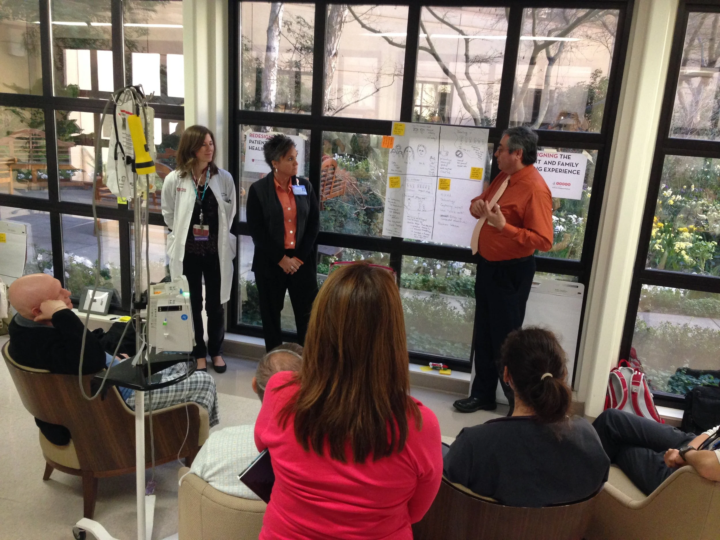 Sharing prototypes with staff and patients in the hallway.