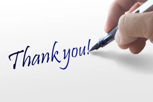 hand-writes-the-word-thank-you_fyUln5HO.jpg