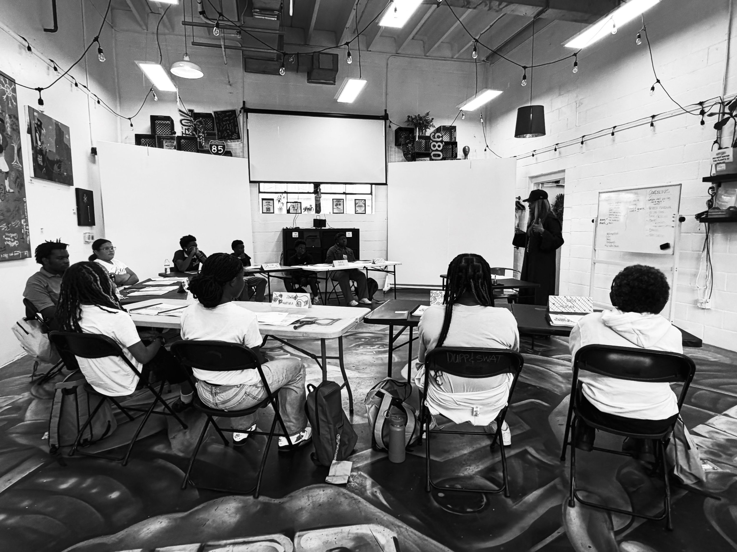 We needed the students AND they came. 

They put their bookbags on the floor.
They found their names at the tables.
They opened their workbooks.
They met the people who would pour into them.

They talked. They listened. They questioned. They created.