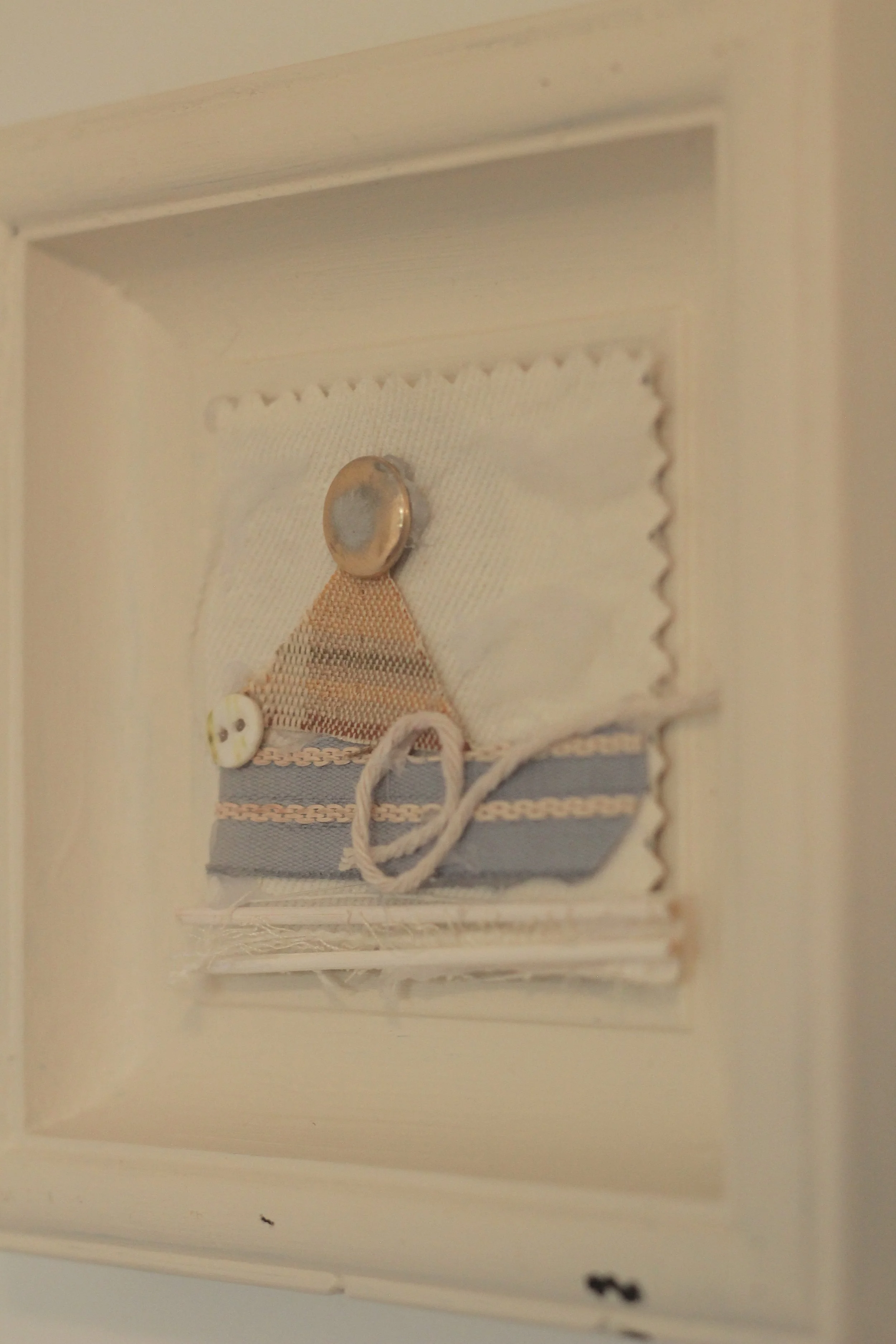 diy-scrap-fabric-art-sailboat-nursery-makeover.JPG