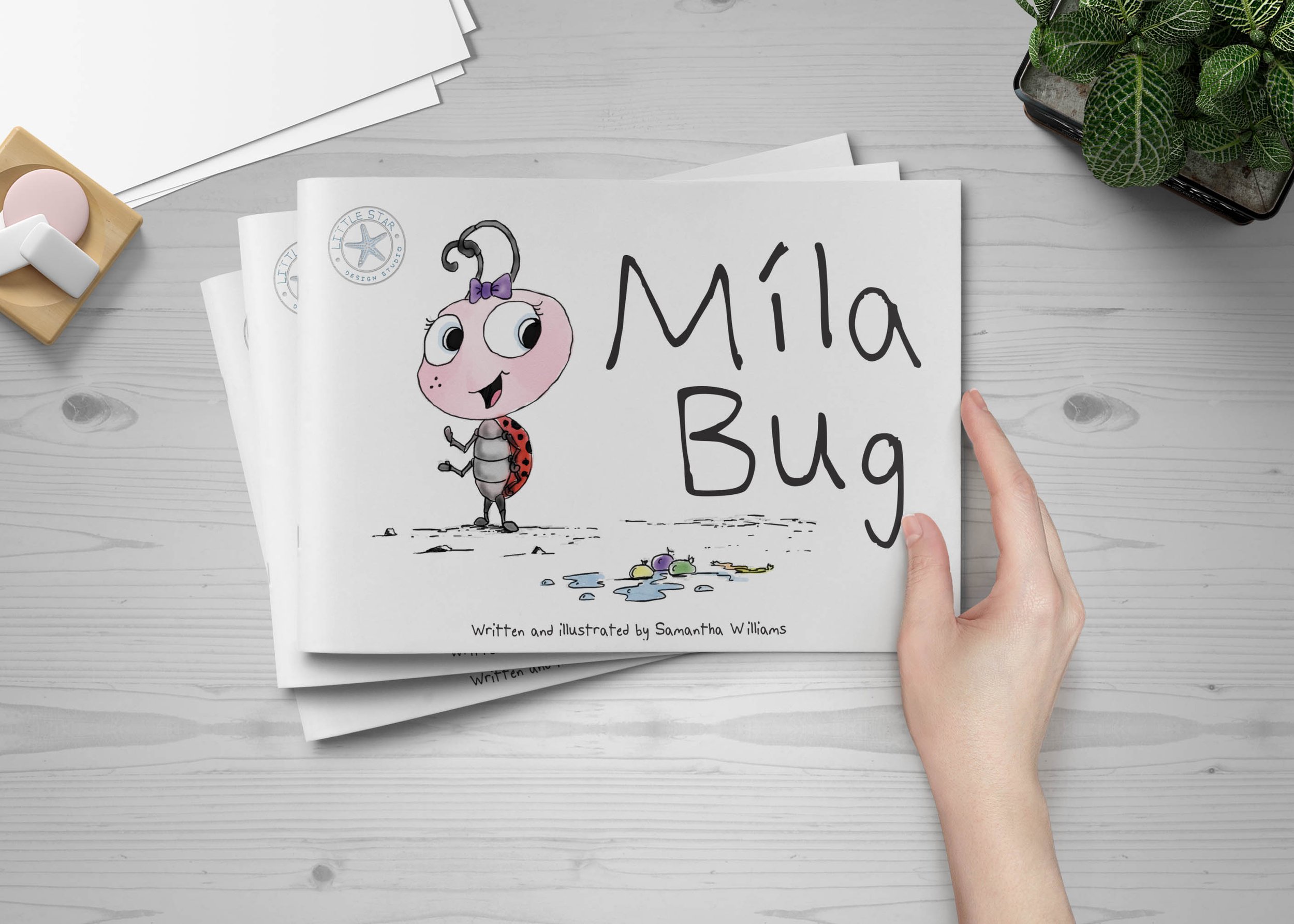mila bug books on table.jpg