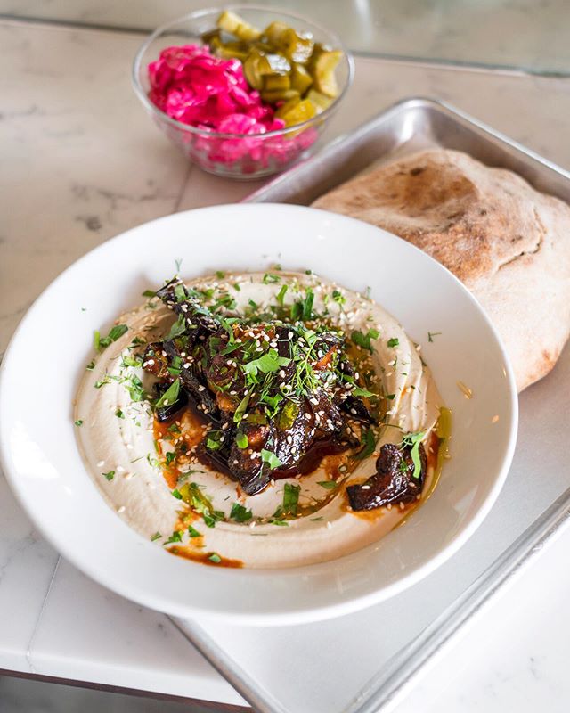 Pro-tip: when enjoying a feast at Hasiba, the hummusiya from the bread geniuses behind @lodgebreadco, always order extra pita. Because &quot;next level&quot; doesn't begin to describe these soft, fluffy discs of carby heaven. Just trust us. ⠀
📍 @has