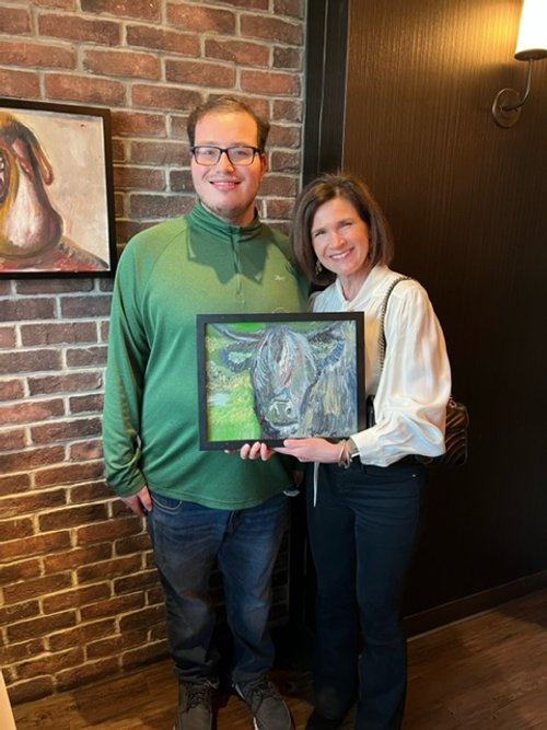 RAF supporter Maureen O'Connor Martin who bought a painting from Spec Wired artist, Dominic DeLuca.