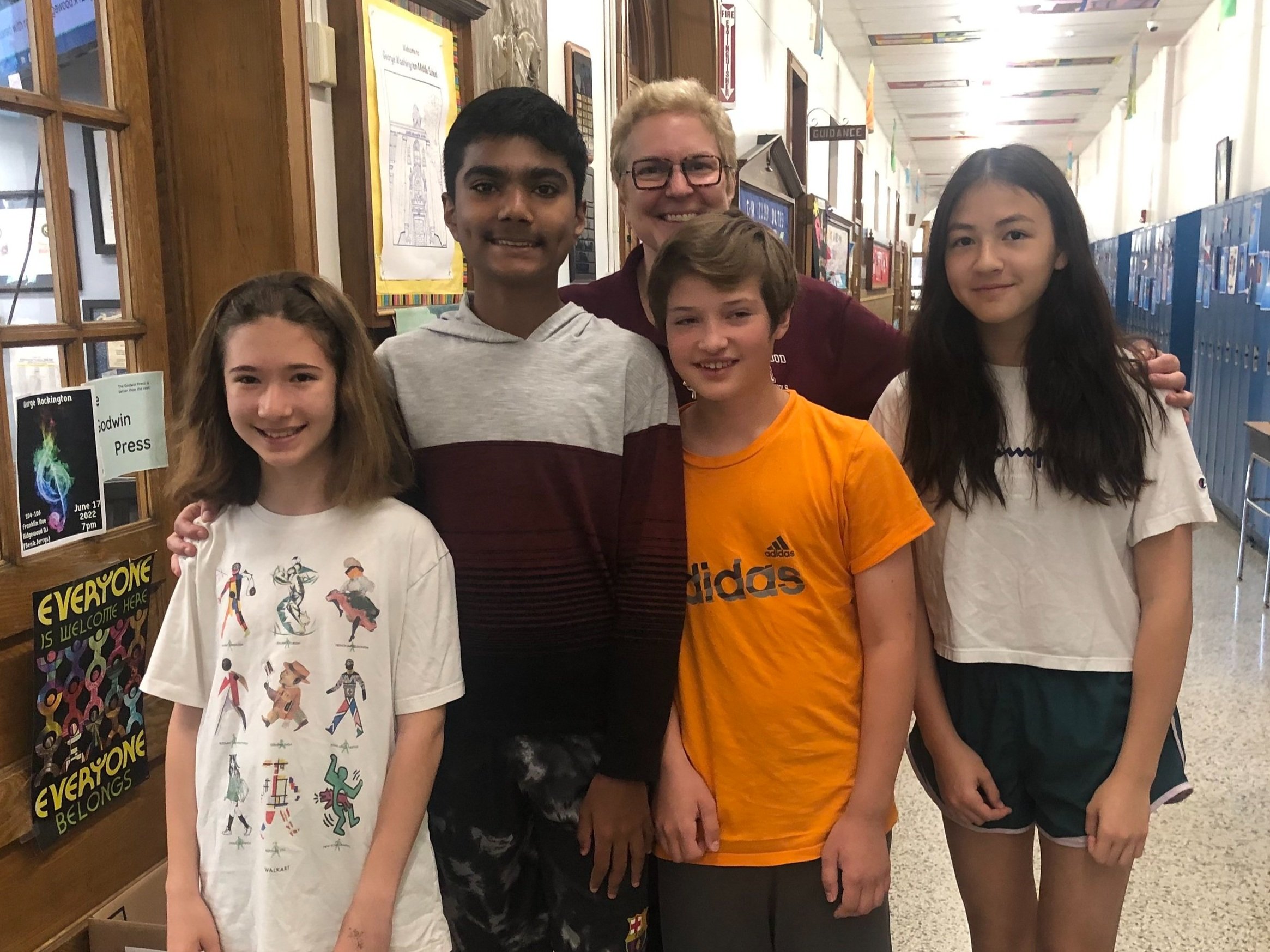  George Washington Middle School scholarship recipients Margot Melamed, Arnav Menezes, Isaac Rentoul-Gins and Nora Cullen with Principal Katie Kashmanian. Photo: Kristen Plumley. 