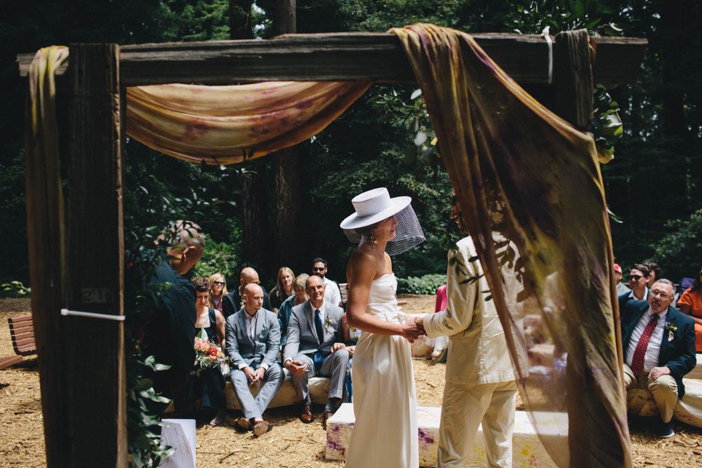 a wedding ceremony in the redwood grove at san francisco botanical garden