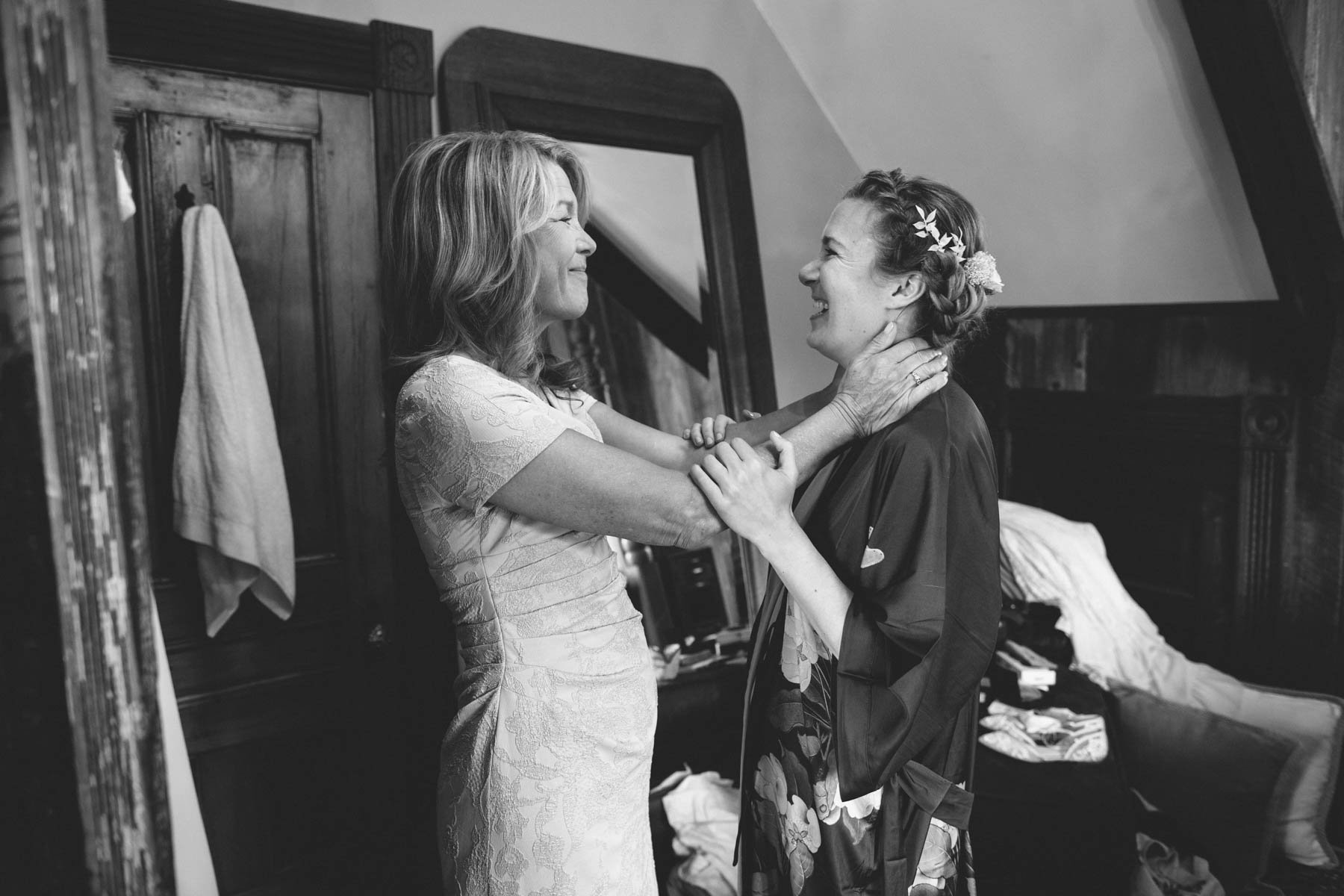 Candid moment between mother and bride on her wedding day at Spring Ranch Mendocino