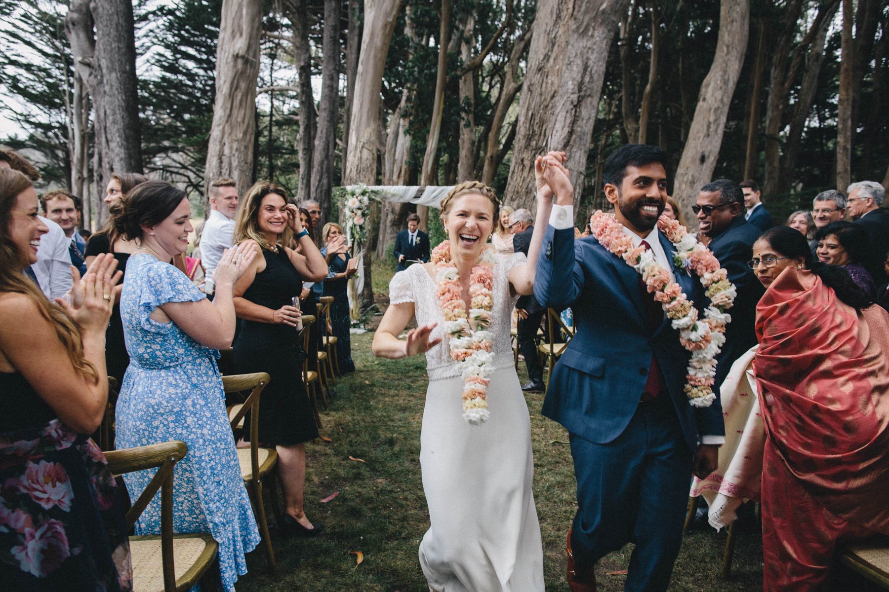 Couple celebrate during their recessional at Spring Ranch Mendocino