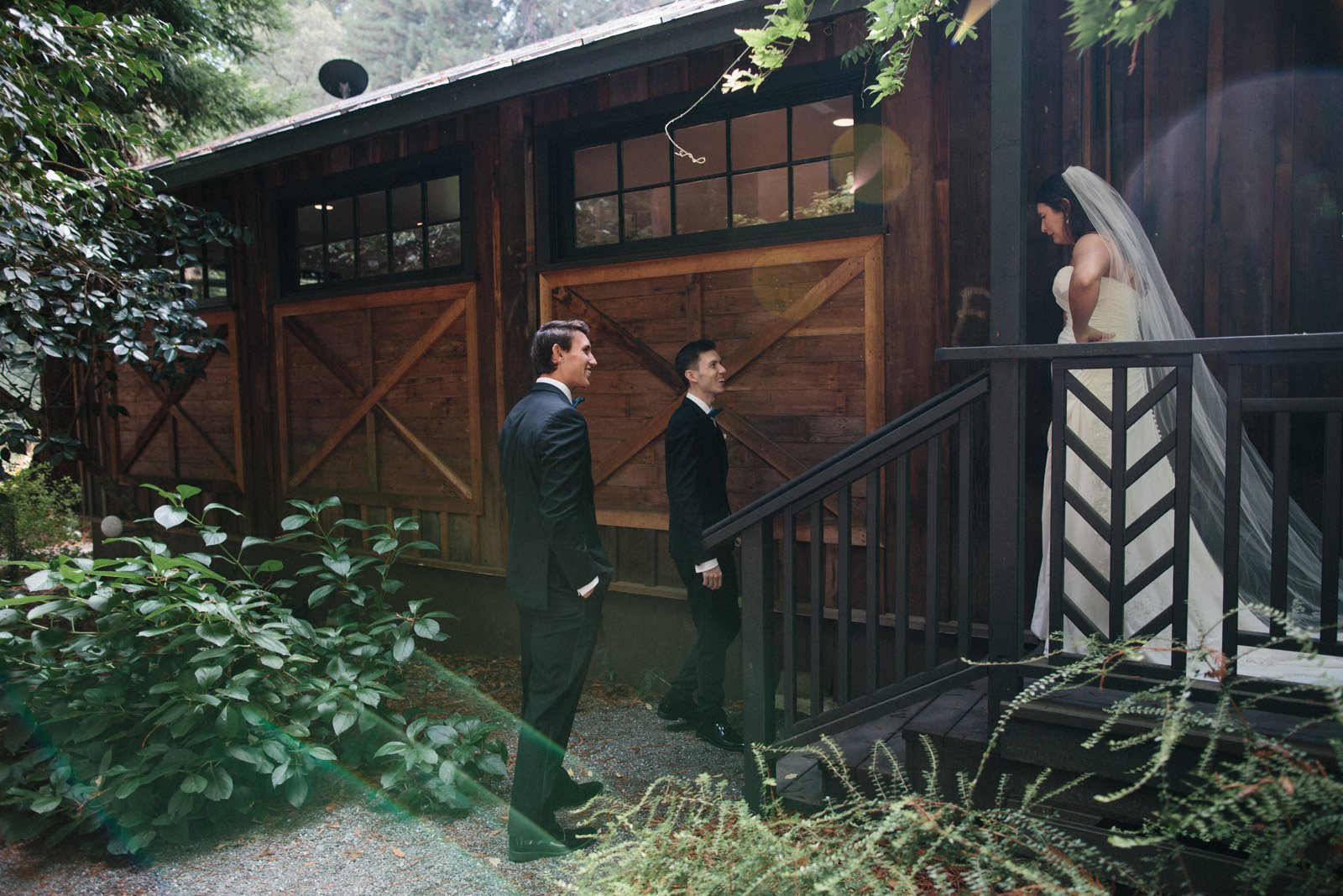 A bride greets her brothers before her wedding ceremony